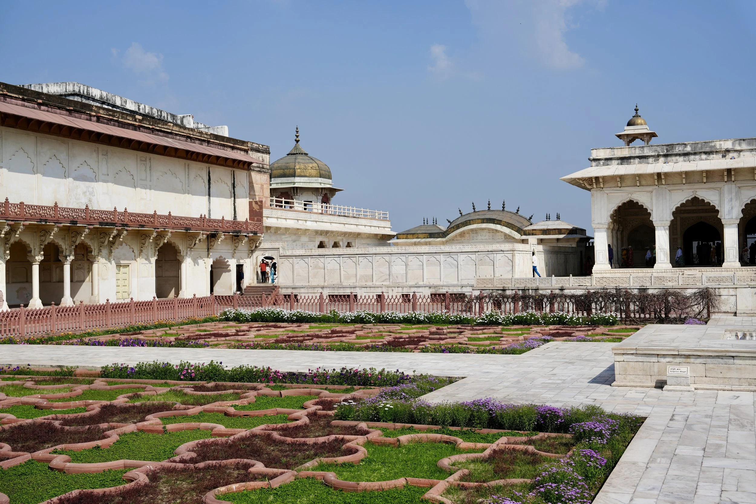 Courtyard inside Agra Fort surrounded by Mughal palaces built in red sandstone and white marble