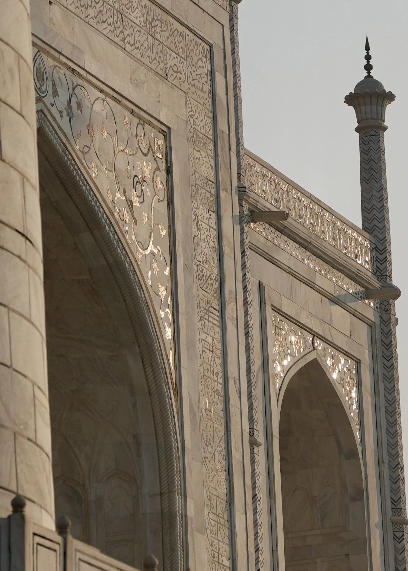 Close-up of marble inlay on the Taj Mahal in early sunlight