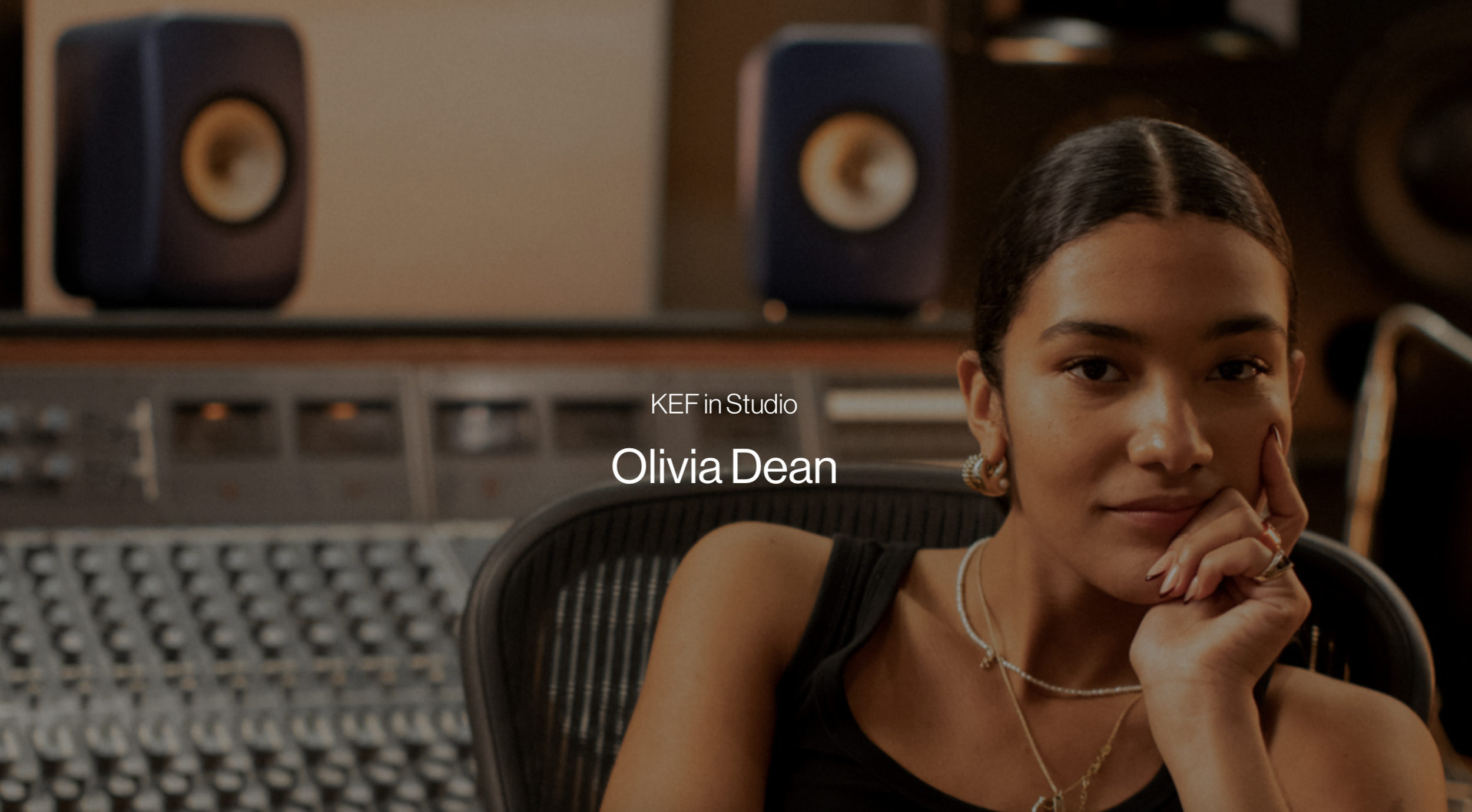 An image of Olivia Dean sitting in a recording studio and text overlay saying 'KEF in Studio Olivia Dean'