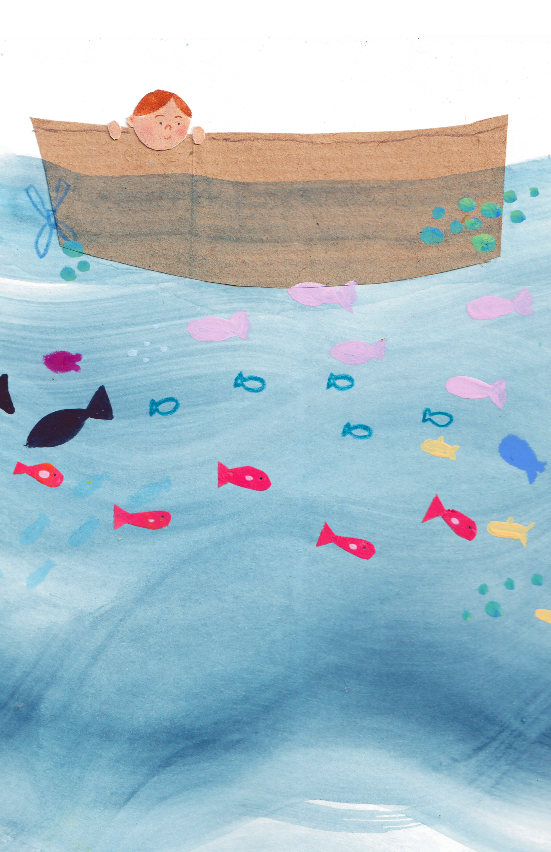 Child with red hair looking over the edge of a cardboard boat in the water, surrounded by colorful fish.