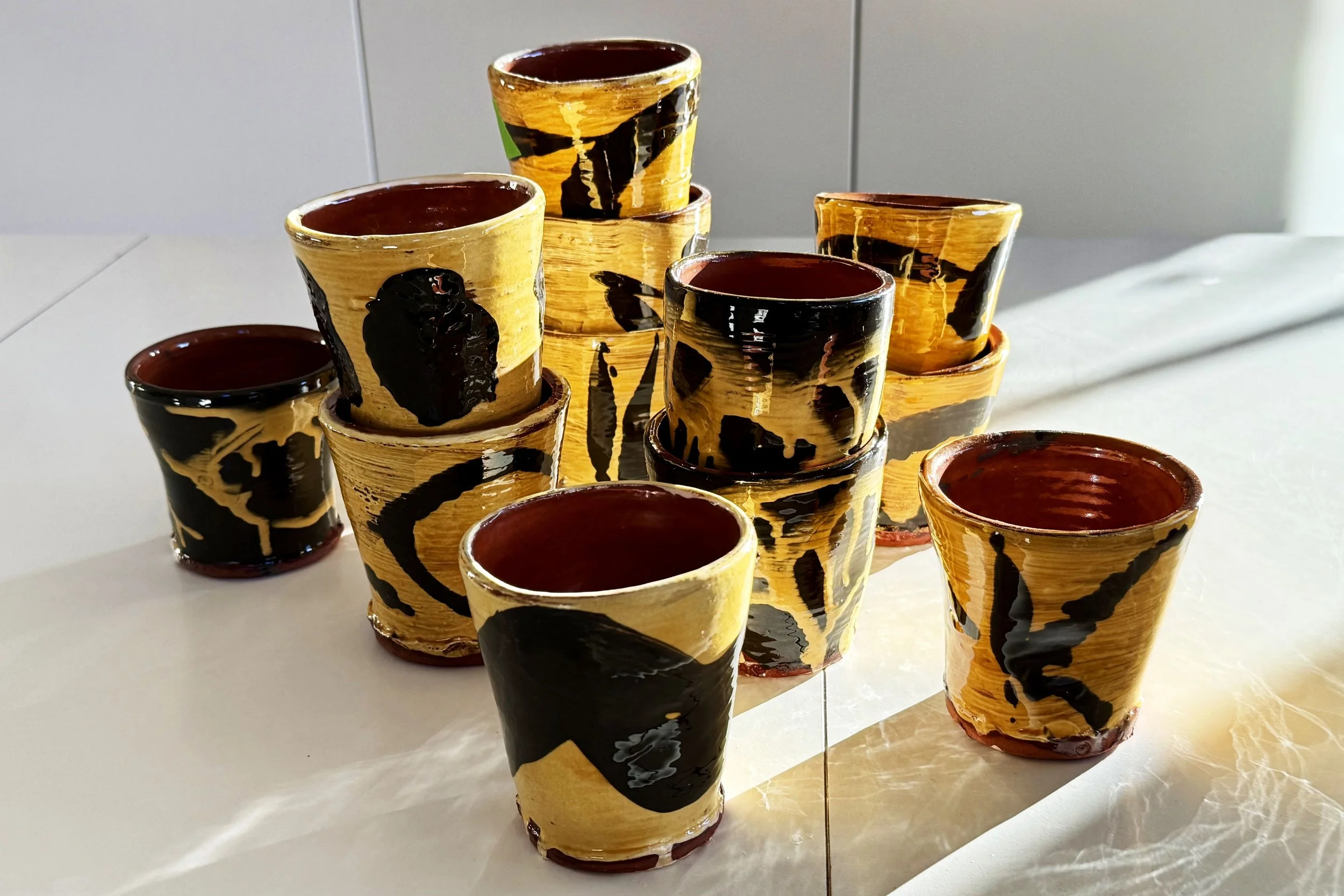 Every single one of these beakers are different, and are 'hugged' by my hand whilst still soft, giving them their own dimples. Plenty of marks from the making process. 10-12 cm high and perfect for your favourite drink.