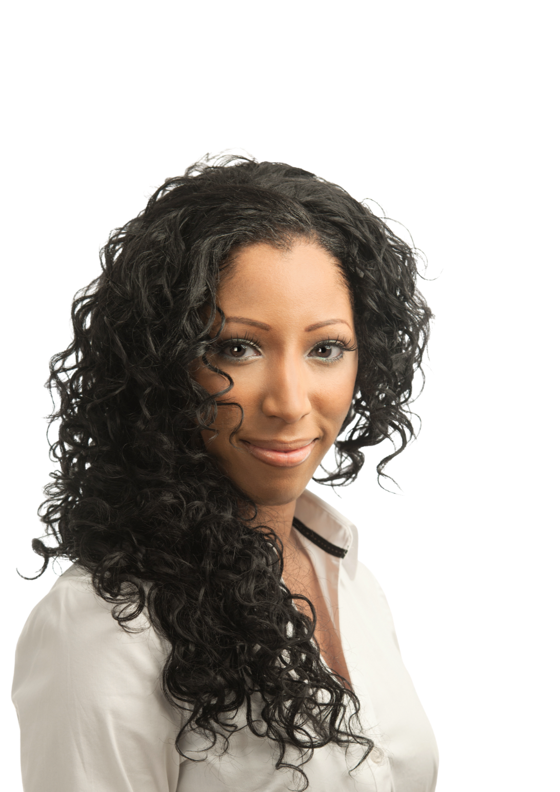 Portrait of a woman with long, curly black hair, smiling slightly, wearing a white blouse.