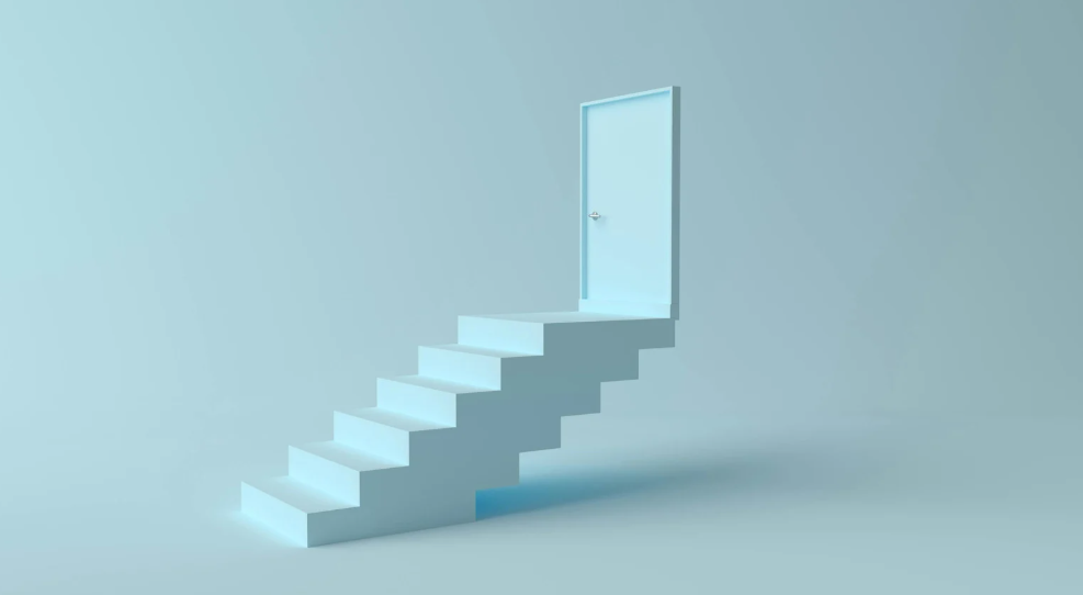 A turquoise floating staircase leading to a locked door