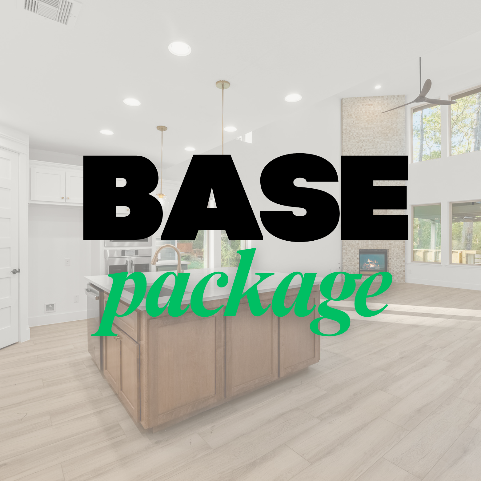 Interior of a modern, spacious living room and kitchen with white walls, large windows, and high ceilings, featuring a kitchen island with a wooden base and white countertop, and a fireplace in the background.