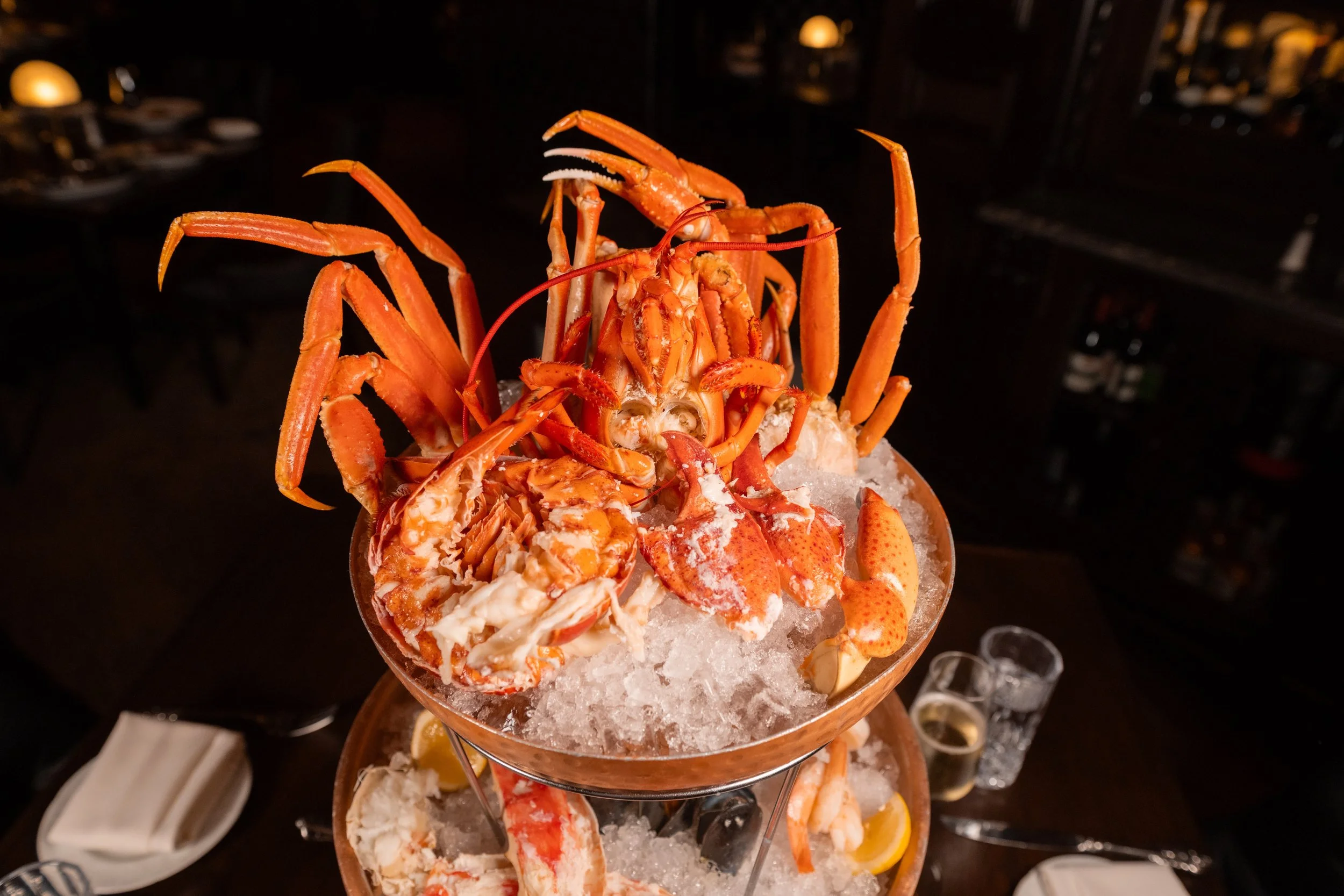 Chilled seafood tower featuring lobster and crab at The Hemingway Steakhouse in Tulsa.