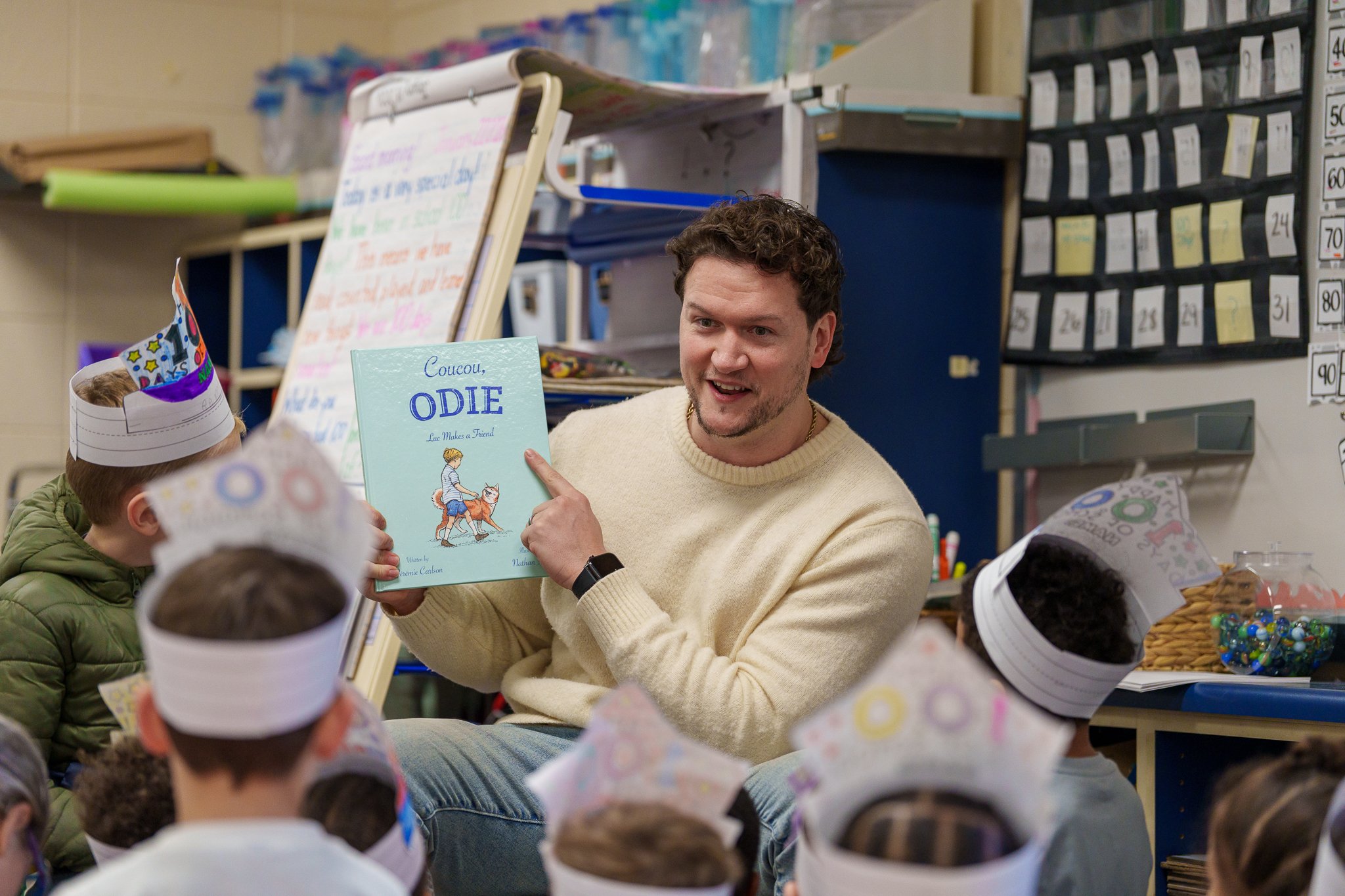 Author reading to group of children.