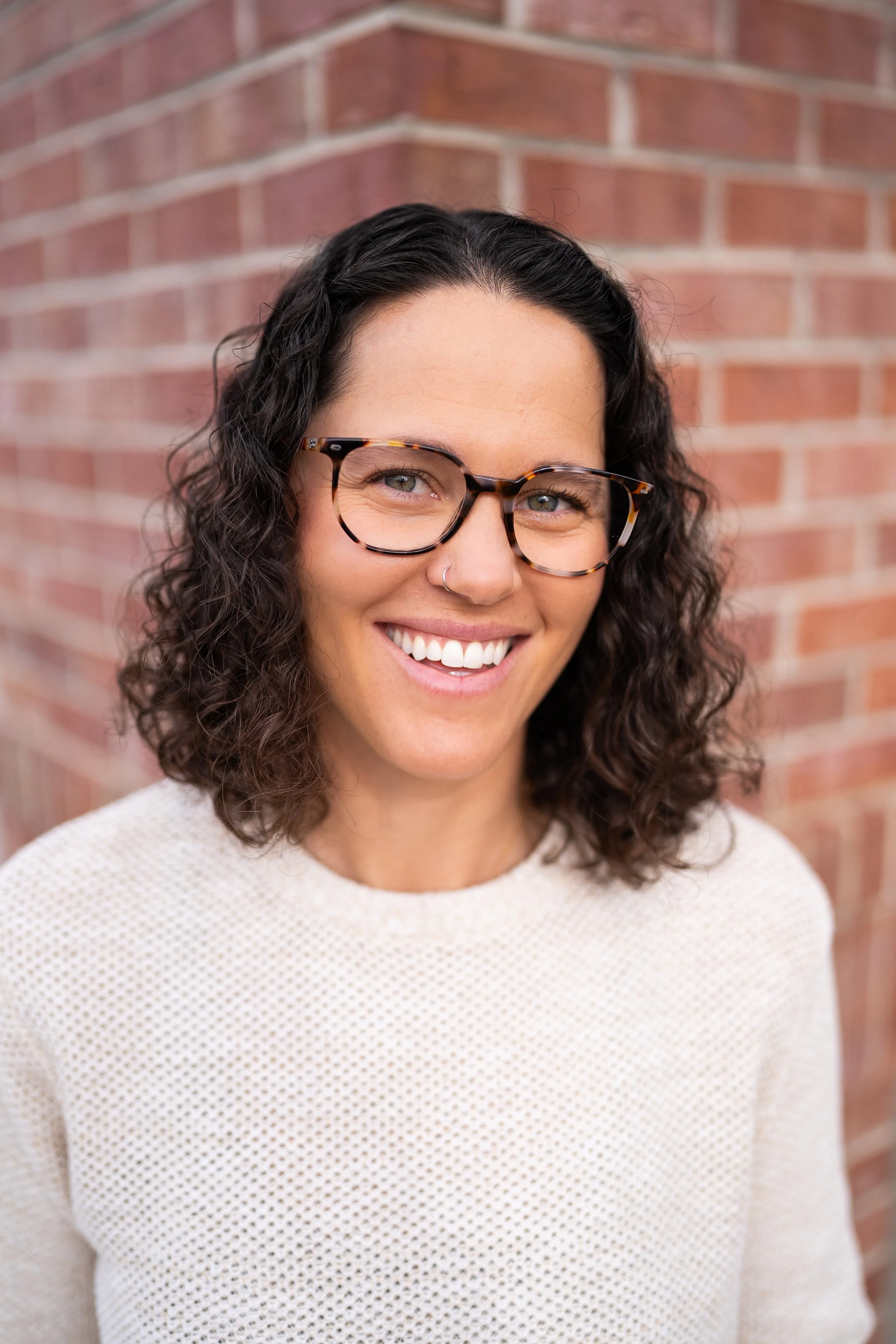 Portrait of a Marriage and Family Therapist Intern providing thoughtful, relational therapy support.