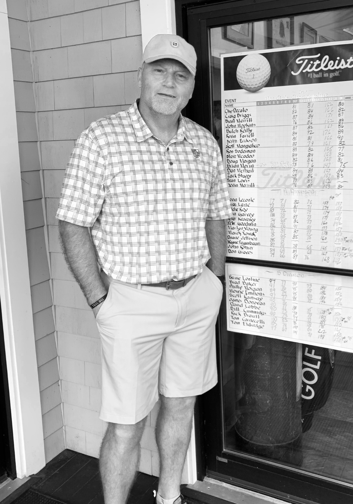 adult man smiling after playing golf thanks to personal training program