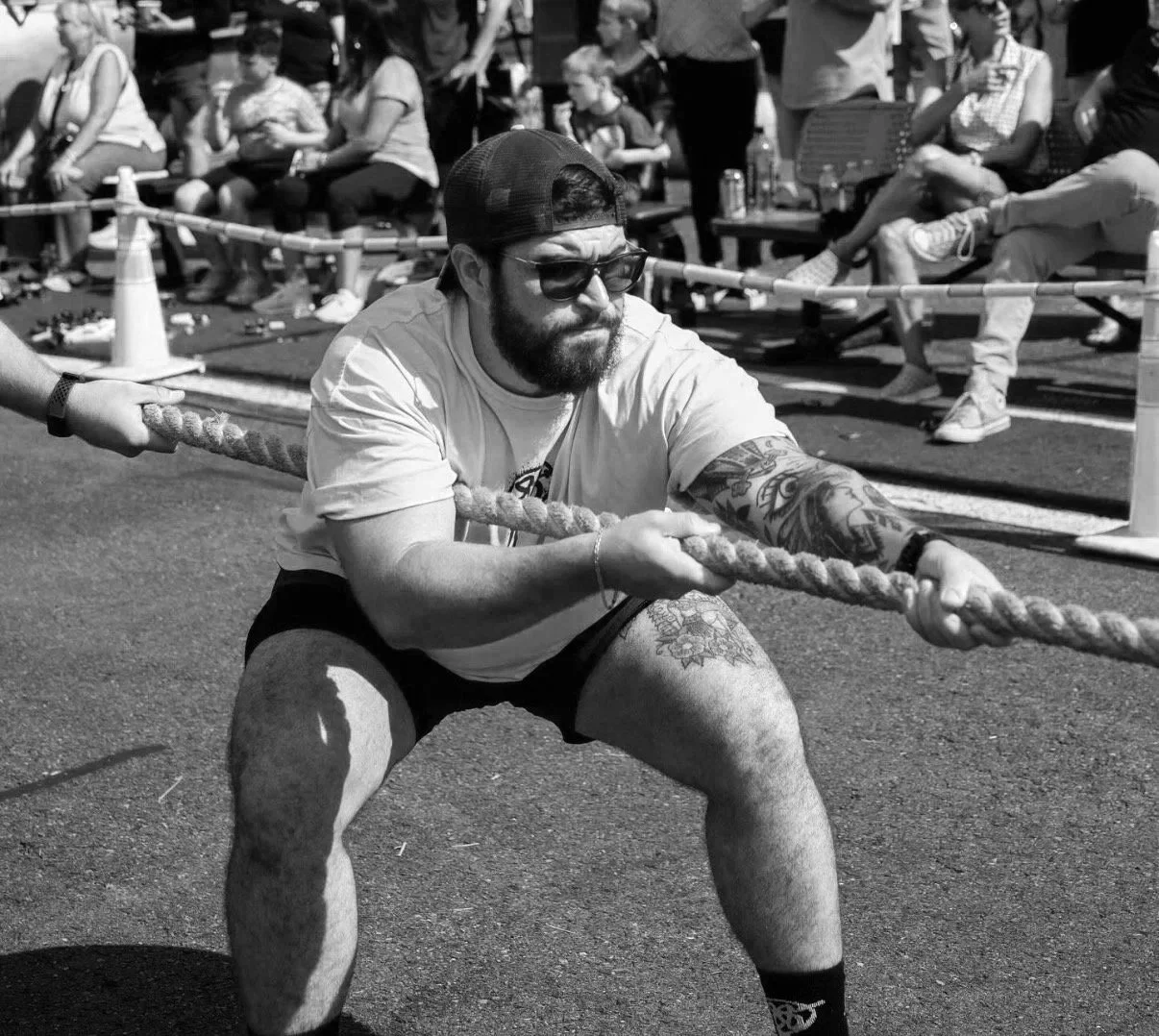 man competing in fitness competition thanks to personal training program