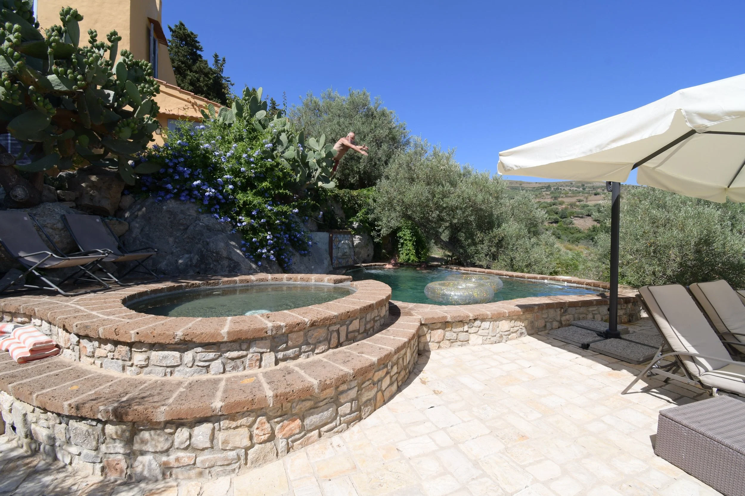 Guests diving into the plunge pool