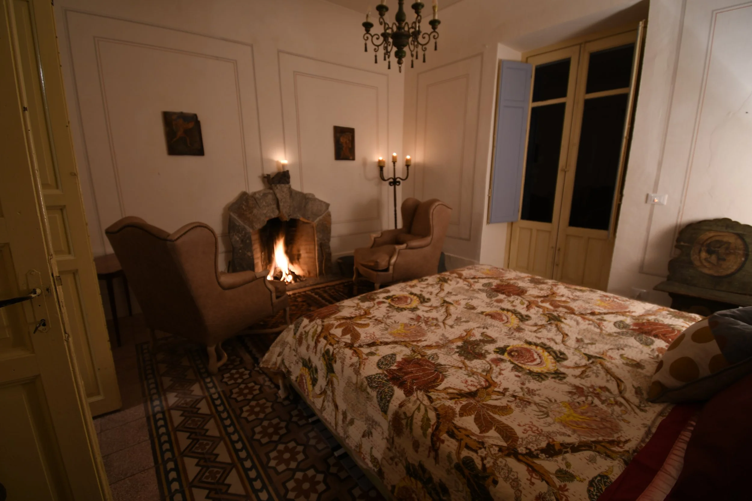 In cooler months the fireplace is both romantic and charming