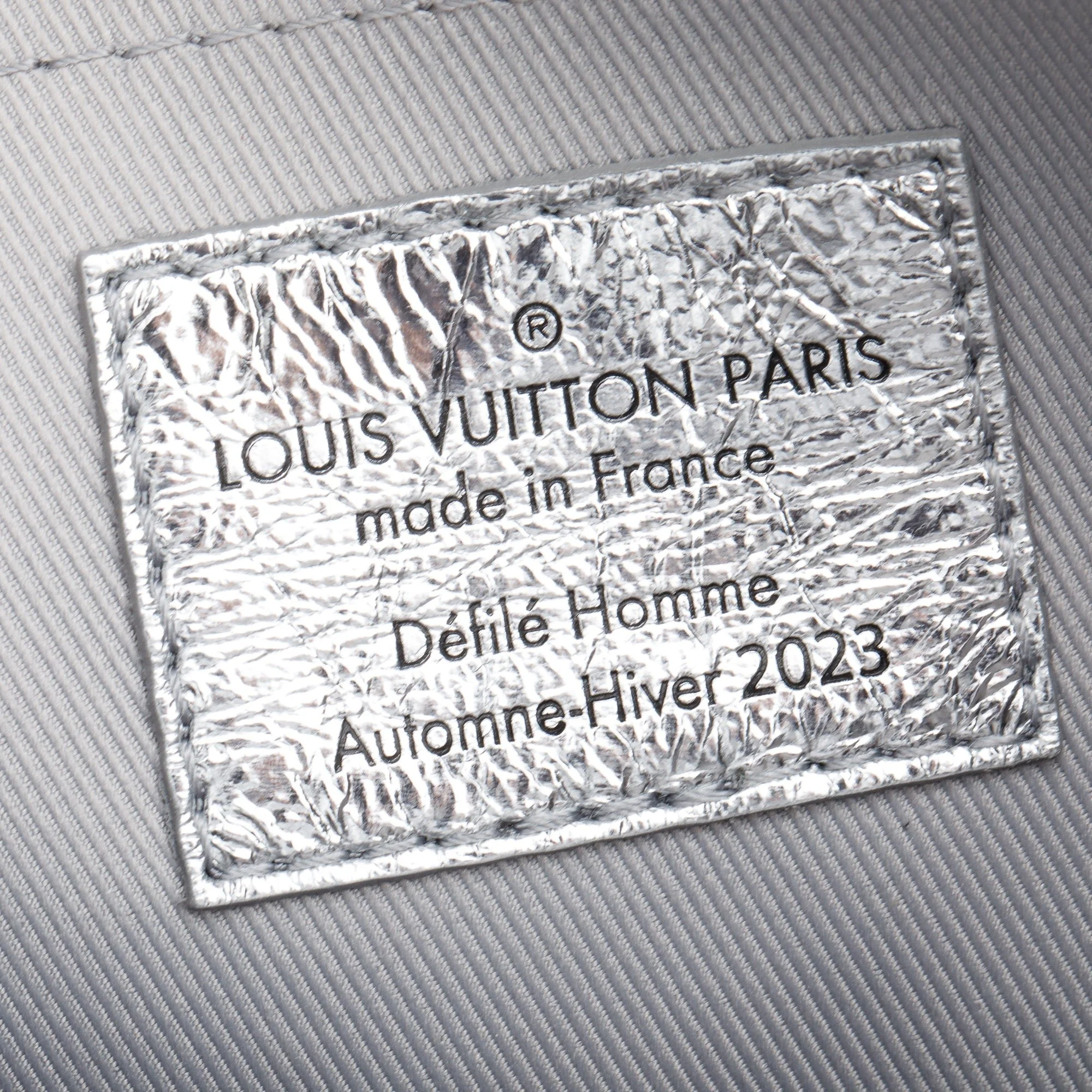 Louis-Vuitton-2023-Silver-Aluminum-Cowhide-Leather-Mini-Soft-Trunk-Crushed-Bag-9.jpg