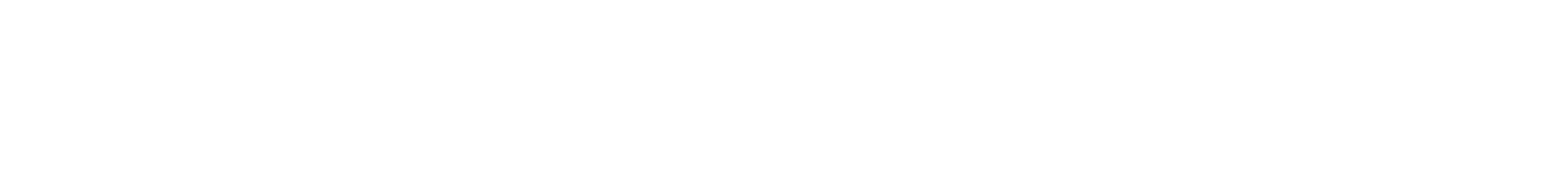 Close-up of a logo or text with black and white stylized letters spelling "T REK."