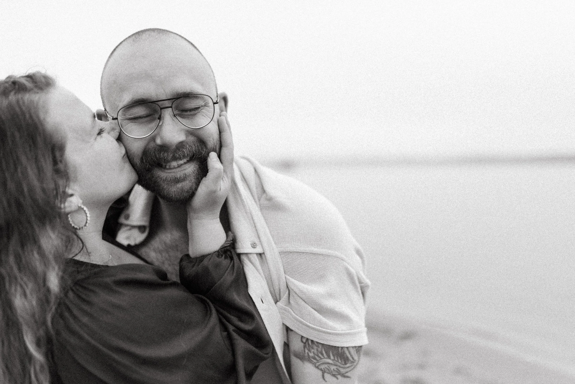 A happy couple on their honeymoon near the great lakes