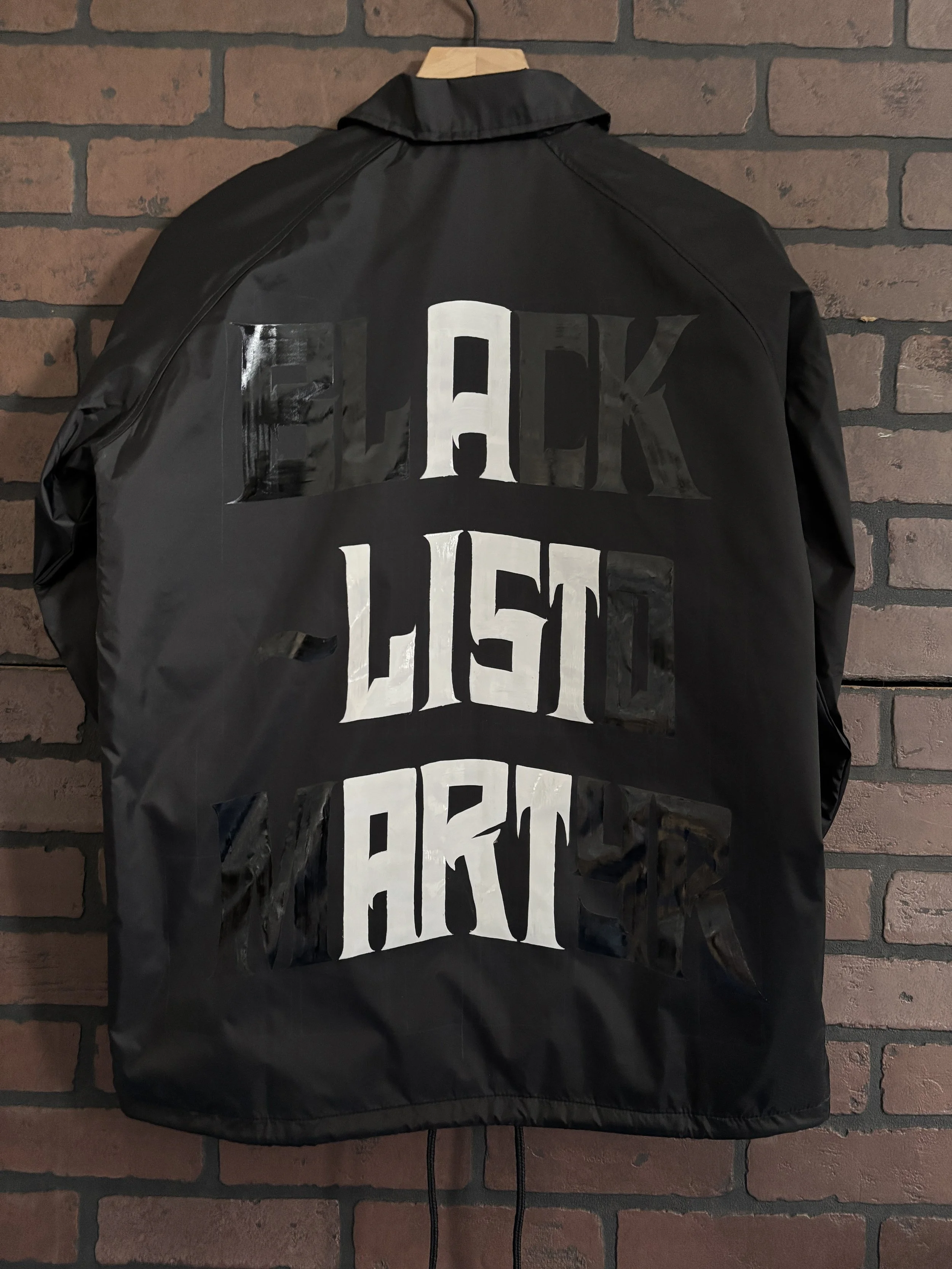 "A-List Art/Black List'd Martyr" - Hand painted windbreaker.