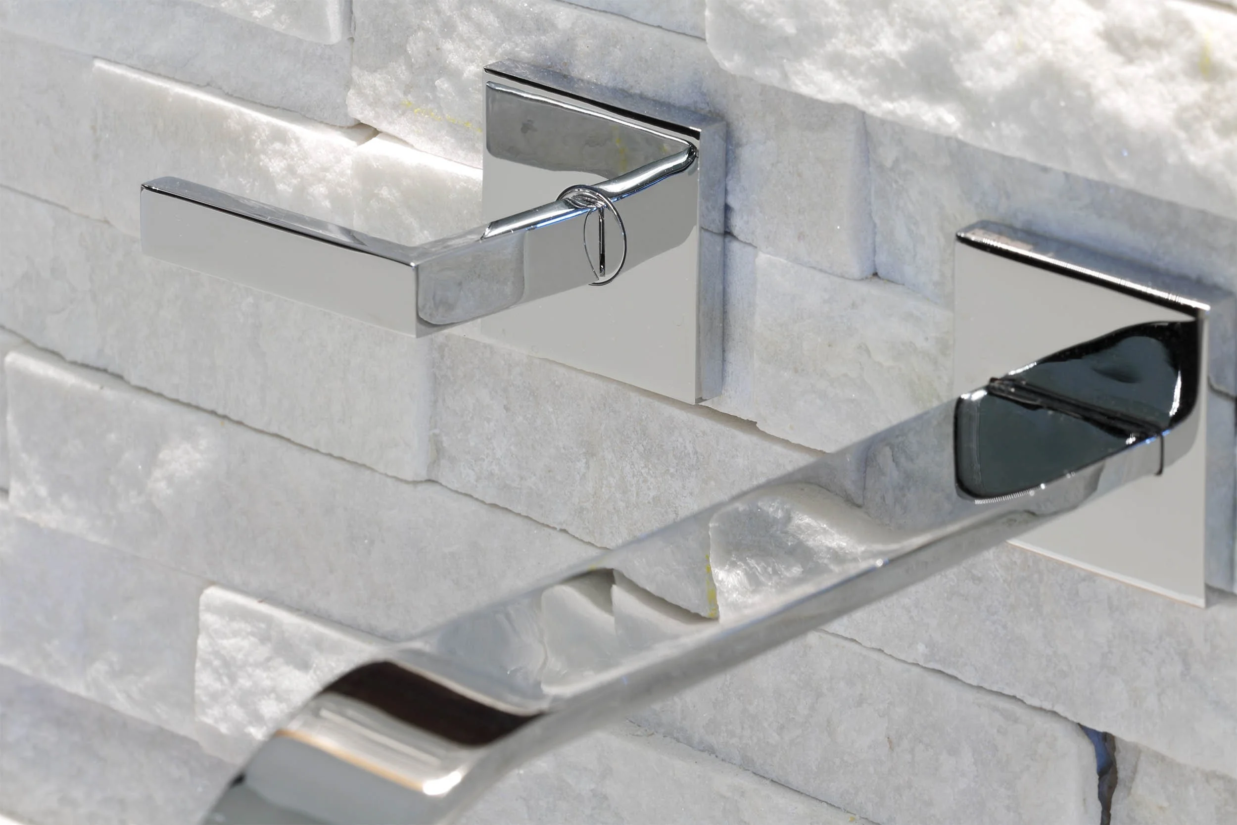 Detail of wall mounted tub filler in primary bath in Old Briarcliff project in Briarcliff Manor, NY.