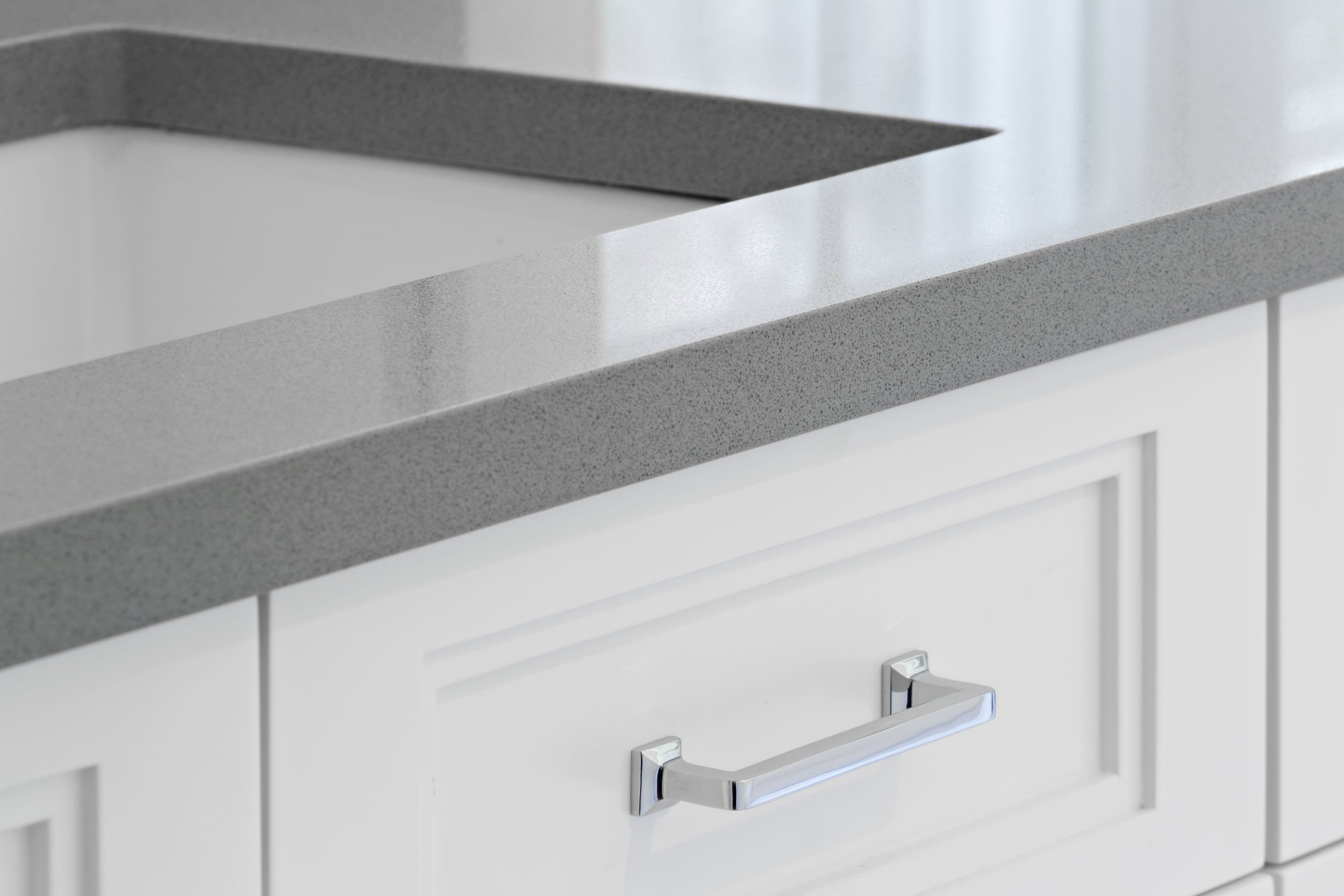Detail of polished nickel vanity hardware and custom cabinetry in a Jack and Jack bathroom at the Dann Farm residence in Pound Ridge, NY.