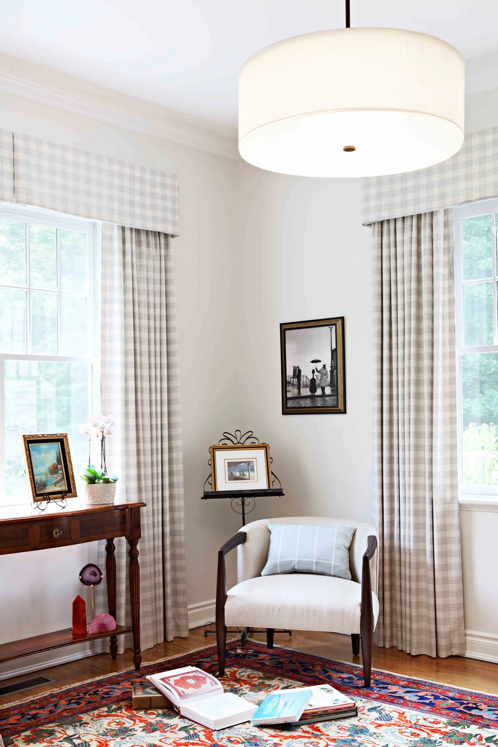Reading Room featuring reading chair and window treatments at Lismore House in Greenwich, Connecticut by Luminosus Designs.