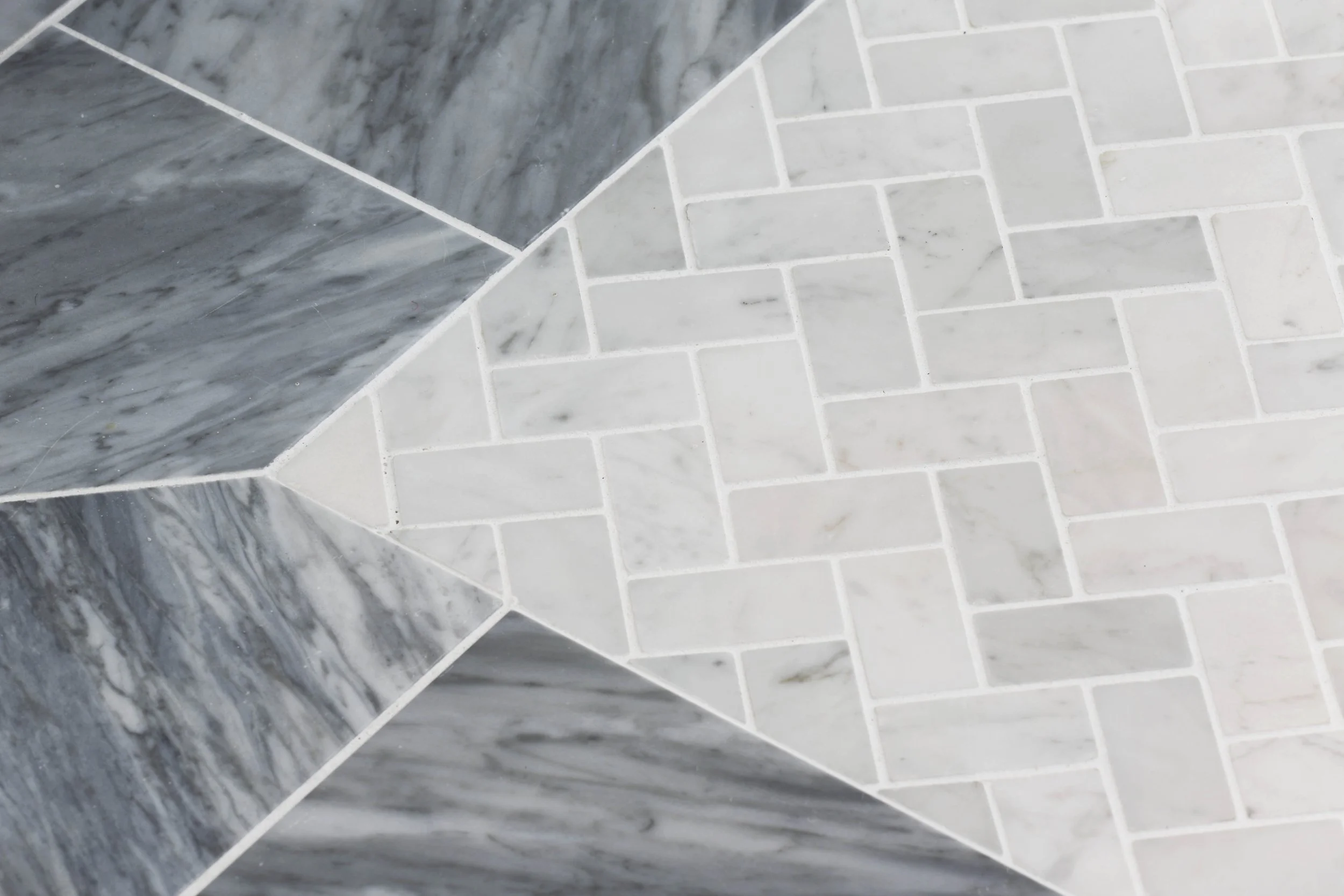Close-up of marble floor tile detailing in a Jack and Jack bathroom at the Dann Farm home in Pound Ridge, NY.