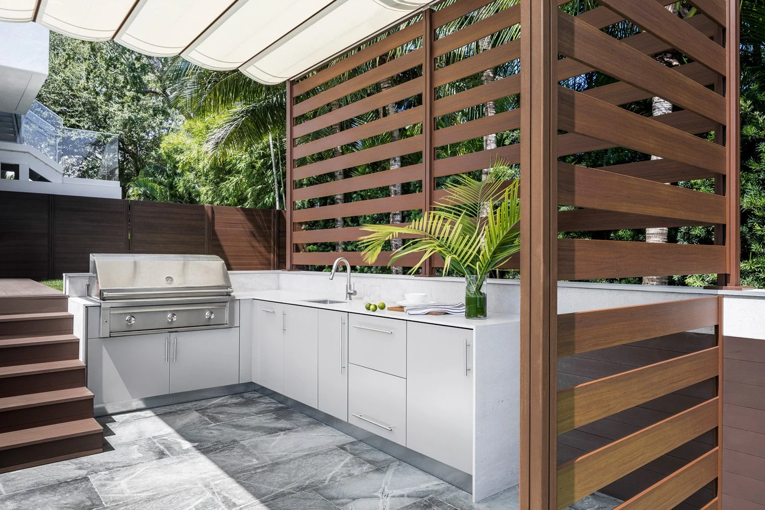 modern outdoor kitchen with minimalistic cabinetry and countertop