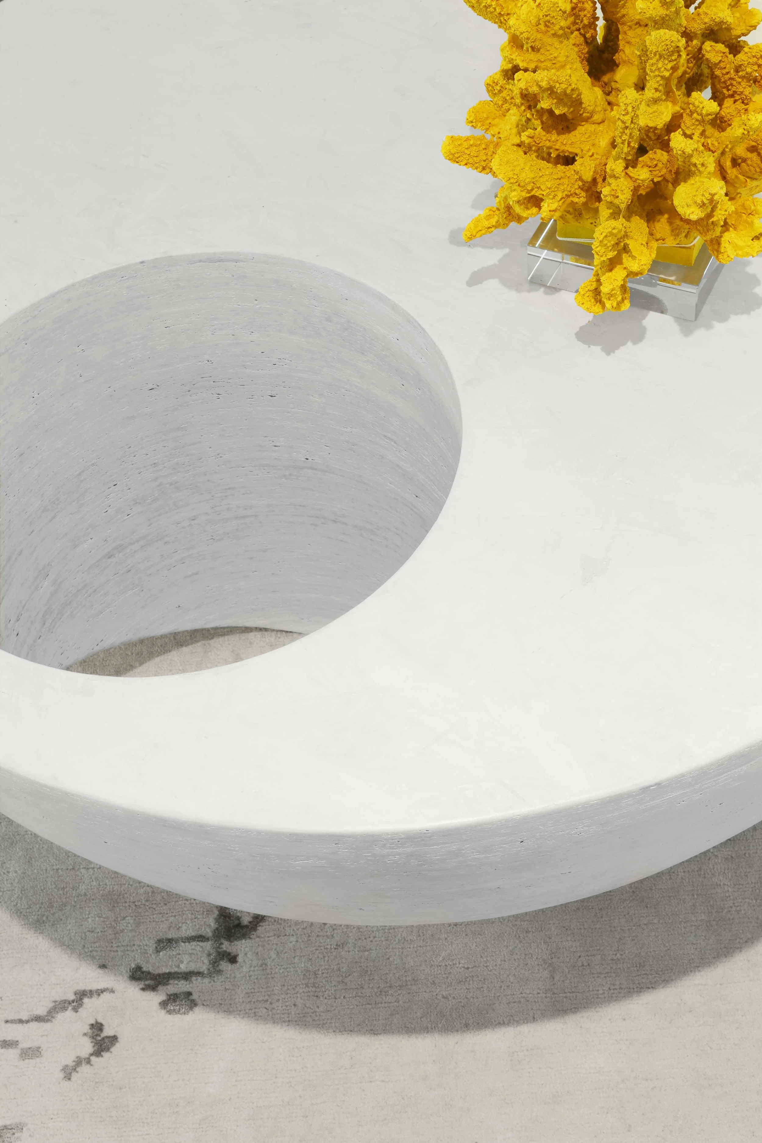 Detail of the sculptural coffee table and decor in the living room at the Meeting House in Greenwich, CT.