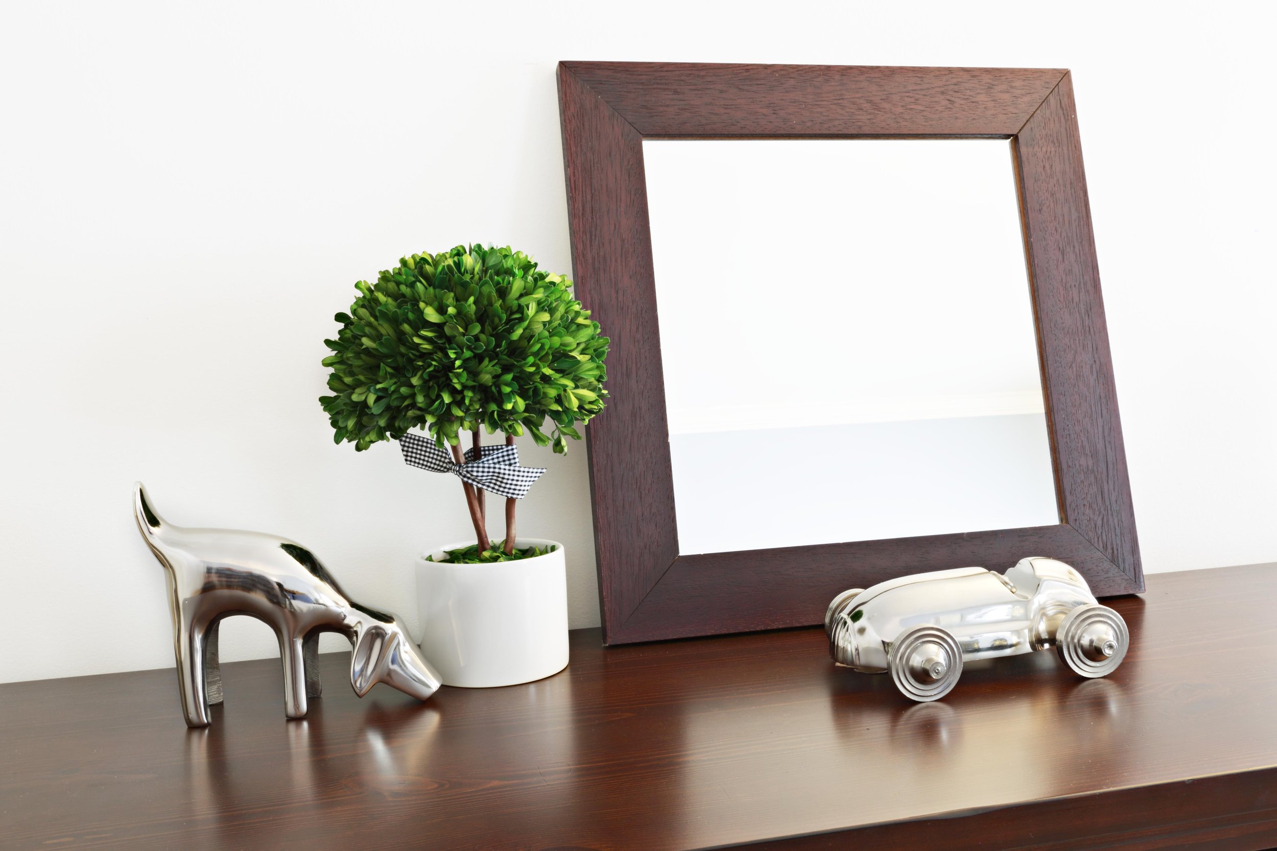 Styling detail in a boy’s bedroom for the Old Wagon project in Old Greenwich, CT featuring curated accessories and warm wood finishes.