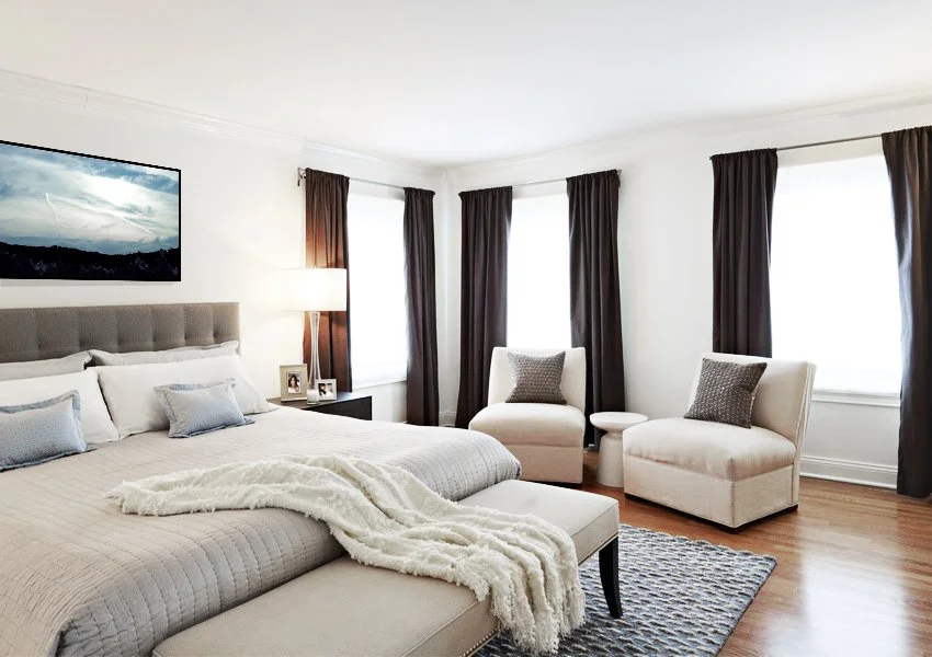 Primary bedroom design for the Old Wagon project in Old Greenwich, CT featuring an upholstered bed, layered textiles, and a calm neutral palette by Luminosus Designs.