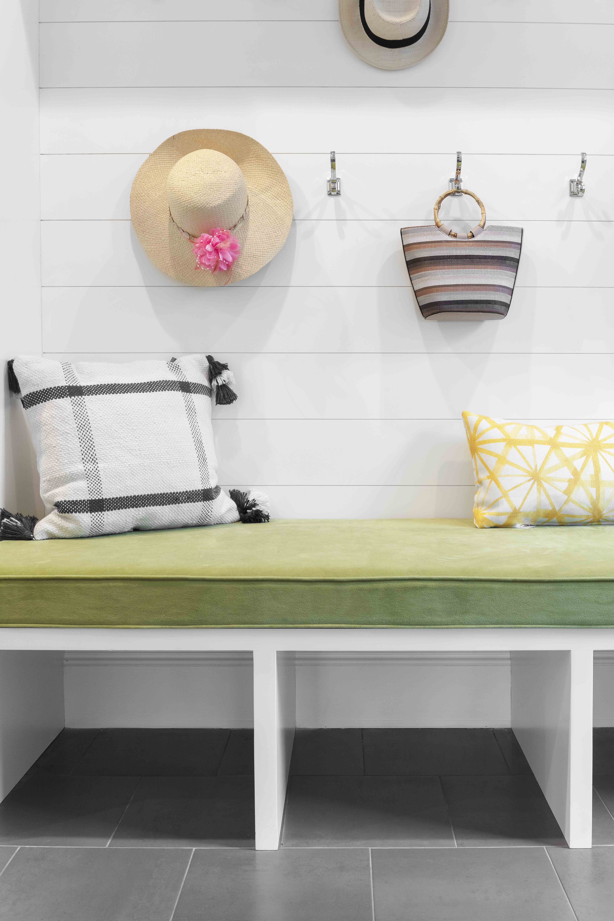 Detail of custom built-in and floor tile in the Glen Oaks, Rye, NY mudroom.