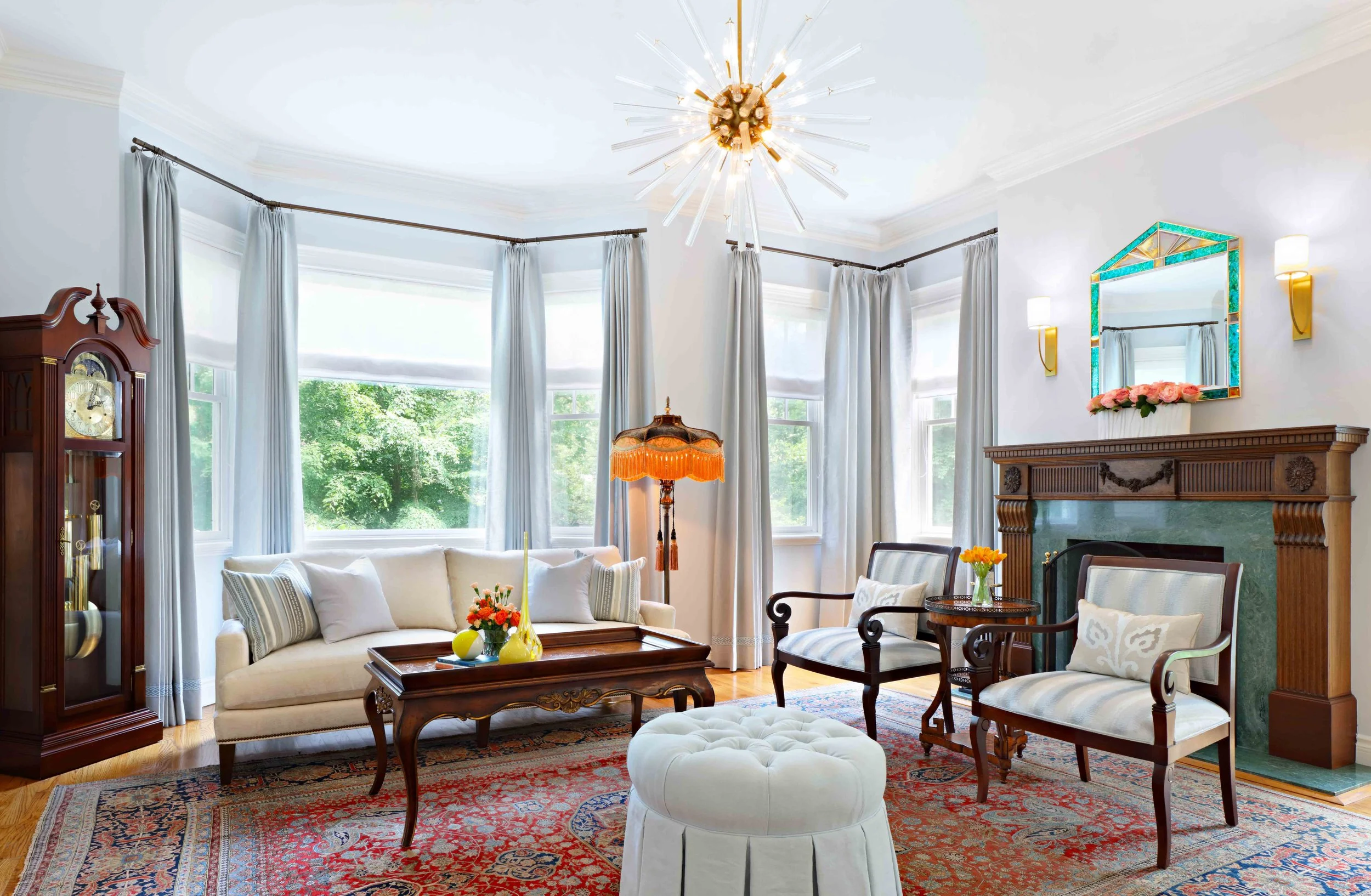 Living Room featuring seating area with bay windows at Lismore House in Greenwich, CT.