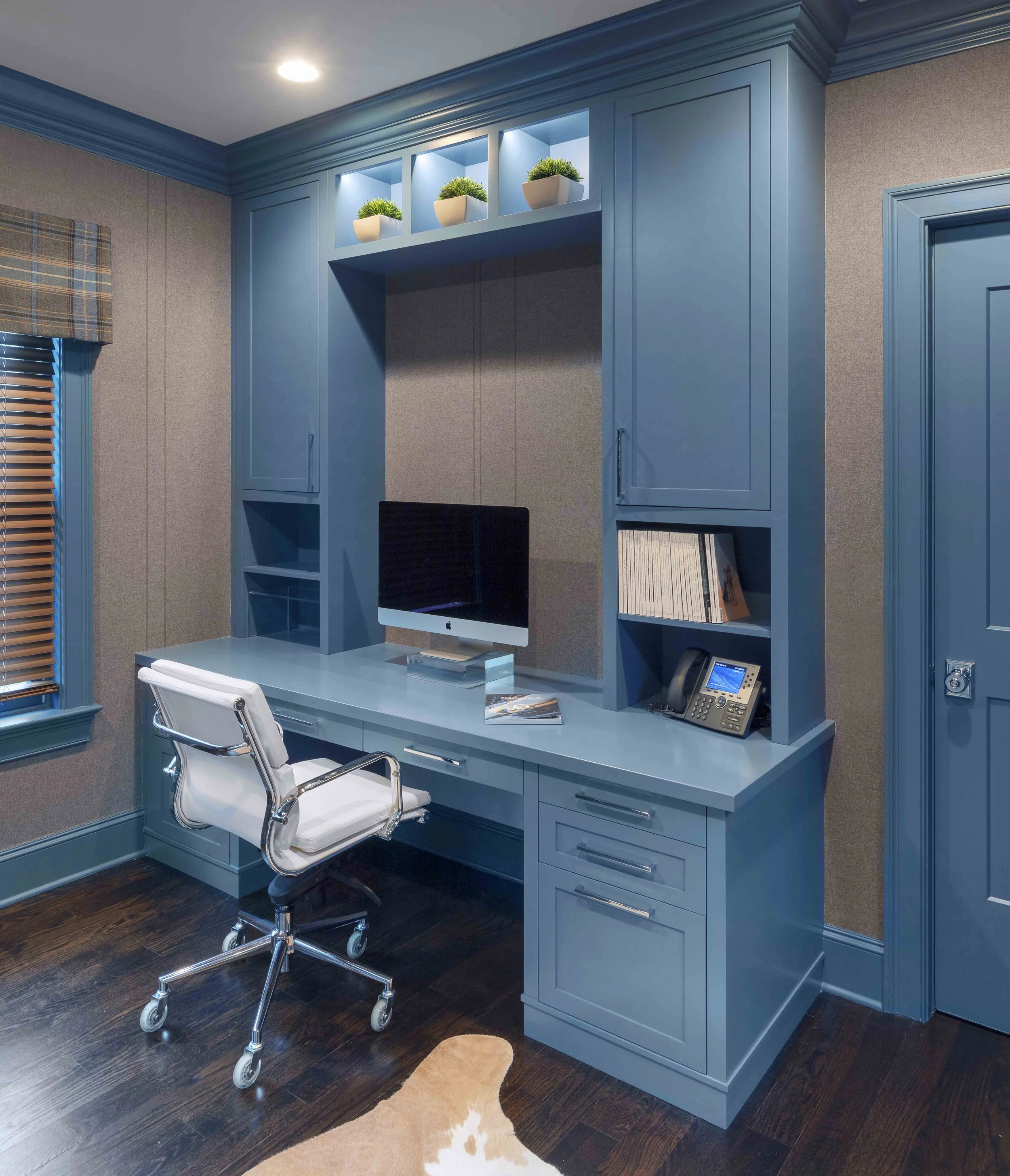 Close-up view of the custom desk and hutch in Glen Oaks home office, designed by Luminosus Designs with a balanced layout and tailored details.