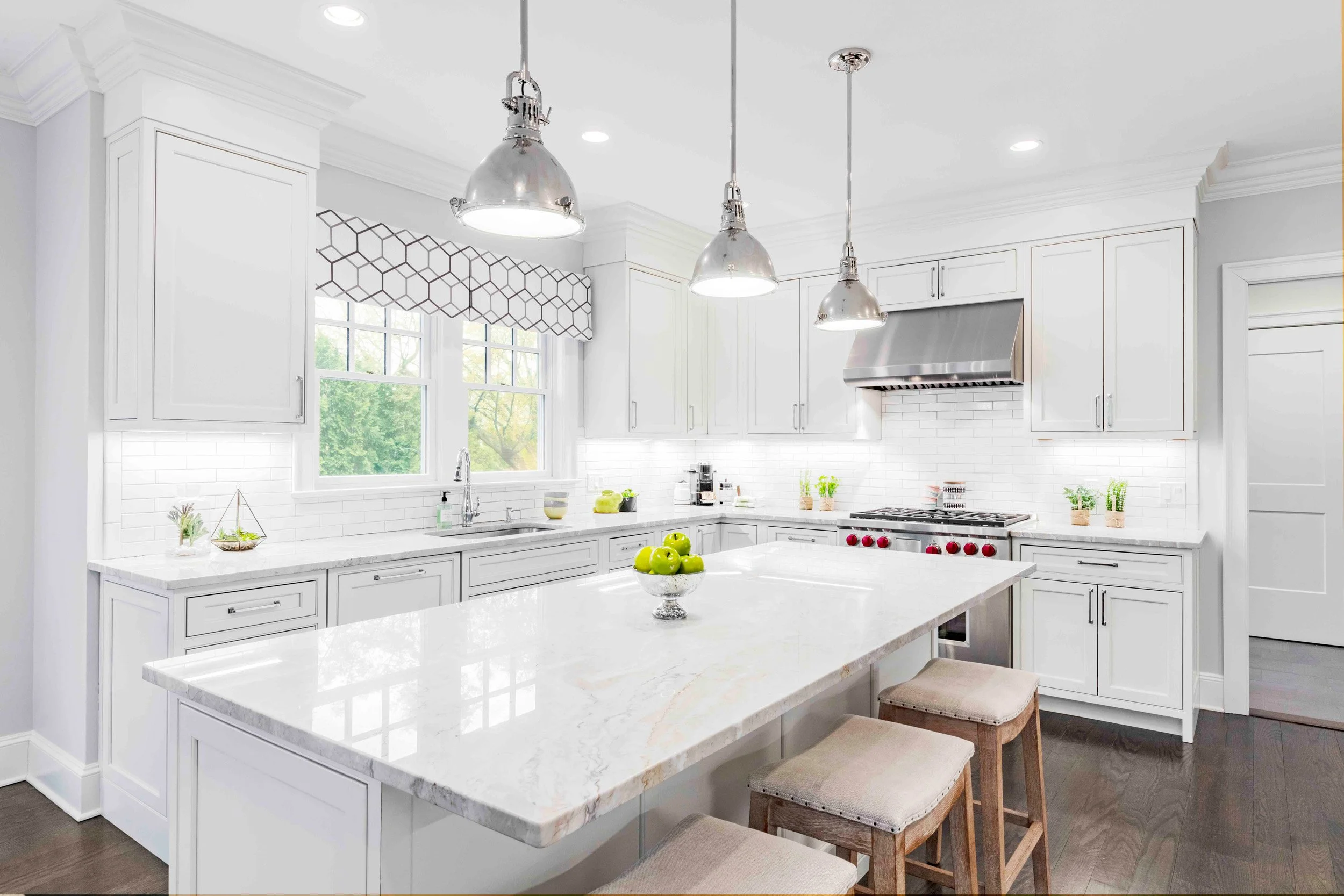 Wide view of the Glen Oaks kitchen in Rye, NY, featuring a functional layout, refined finishes, and thoughtful design by Luminosus Designs.