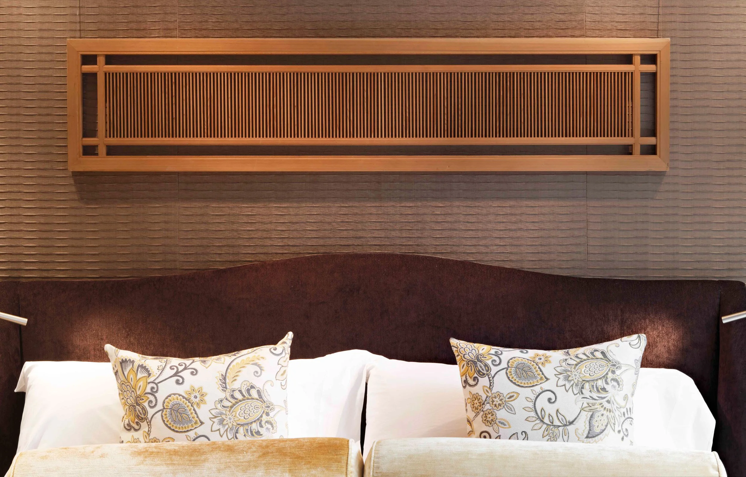 Headboard with antique screen mounted above the bed in Indian Field residence in Greenwich, CT.