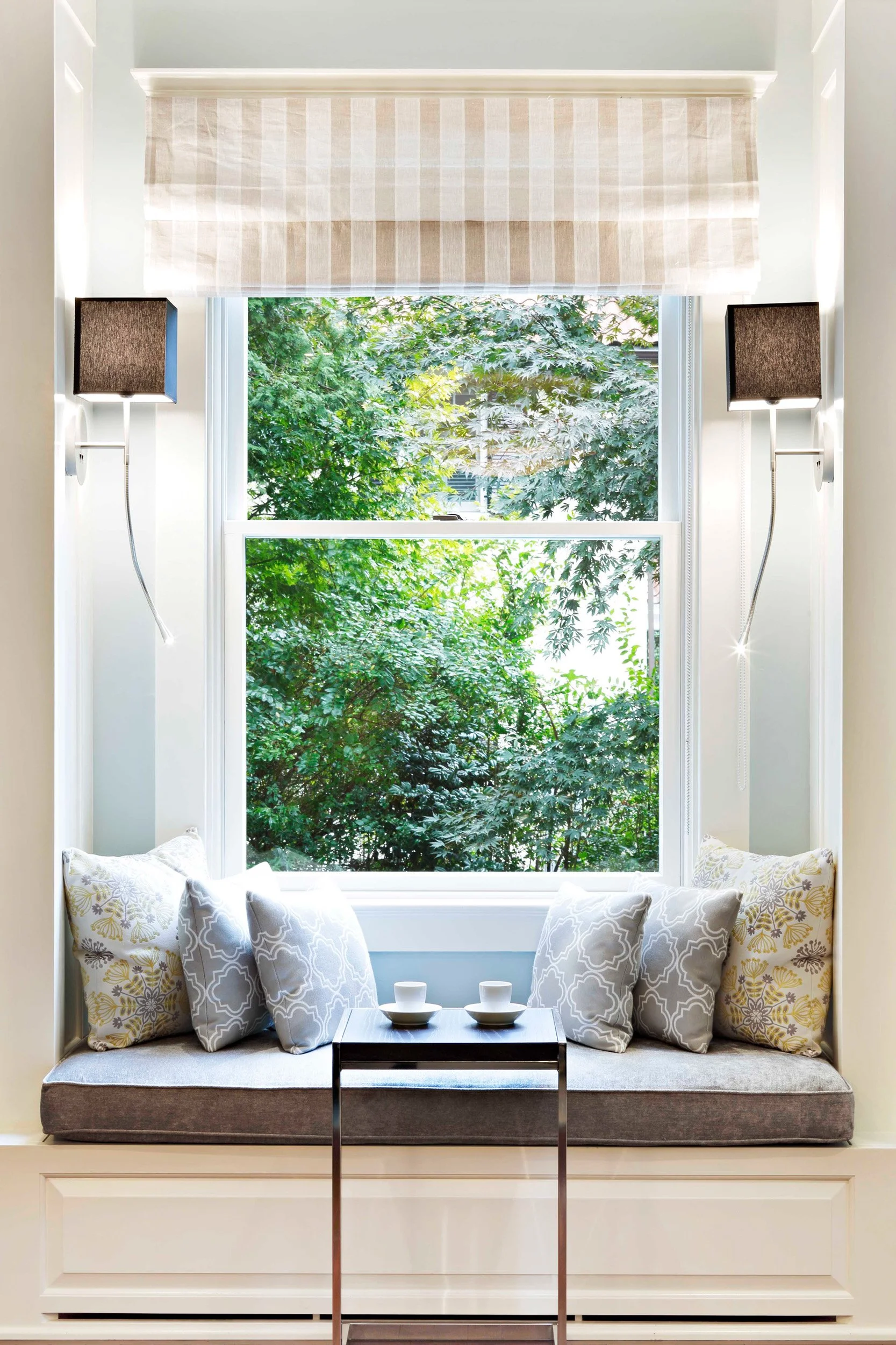 Built-in window seat detail with cushion in Indian Field home in Greenwich, CT.