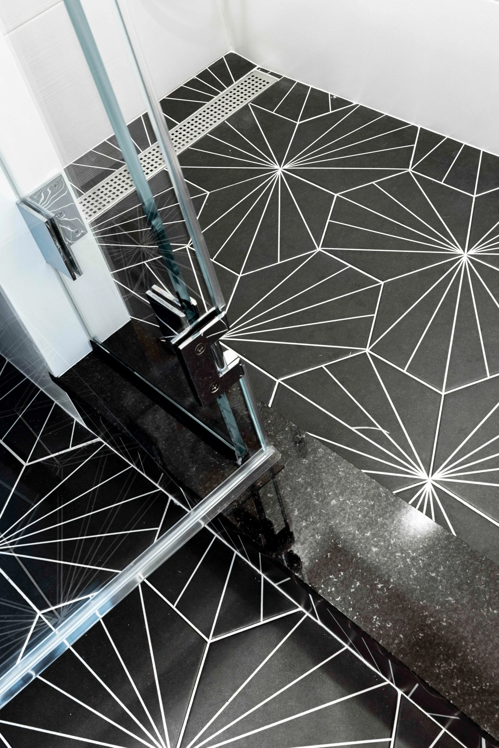 Detail of bathroom floor tile in the Gramercy Arms apartment NYC.