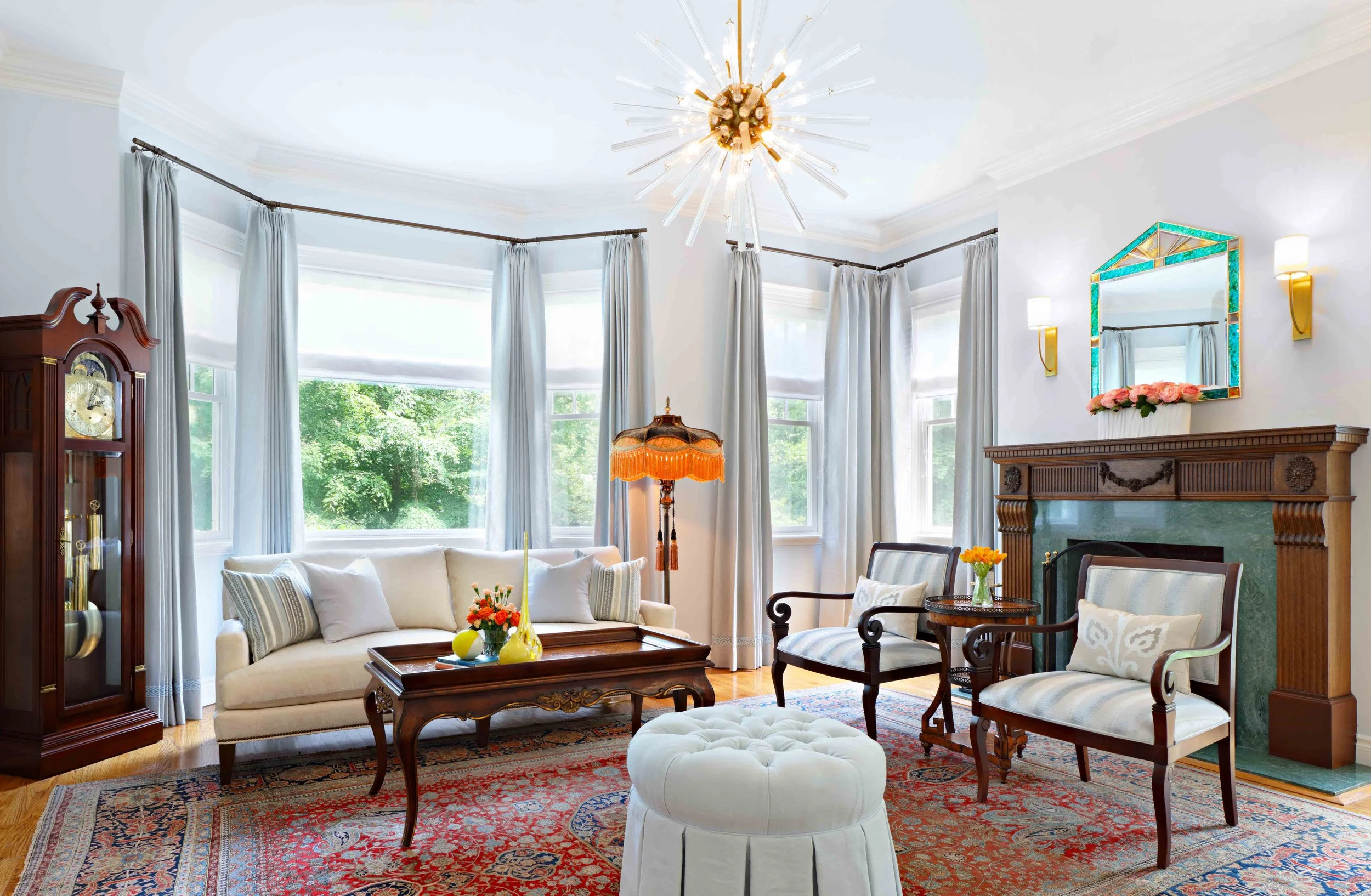 Living Room featuring seating area with bay windows at Lismore House in Greenwich, CT.