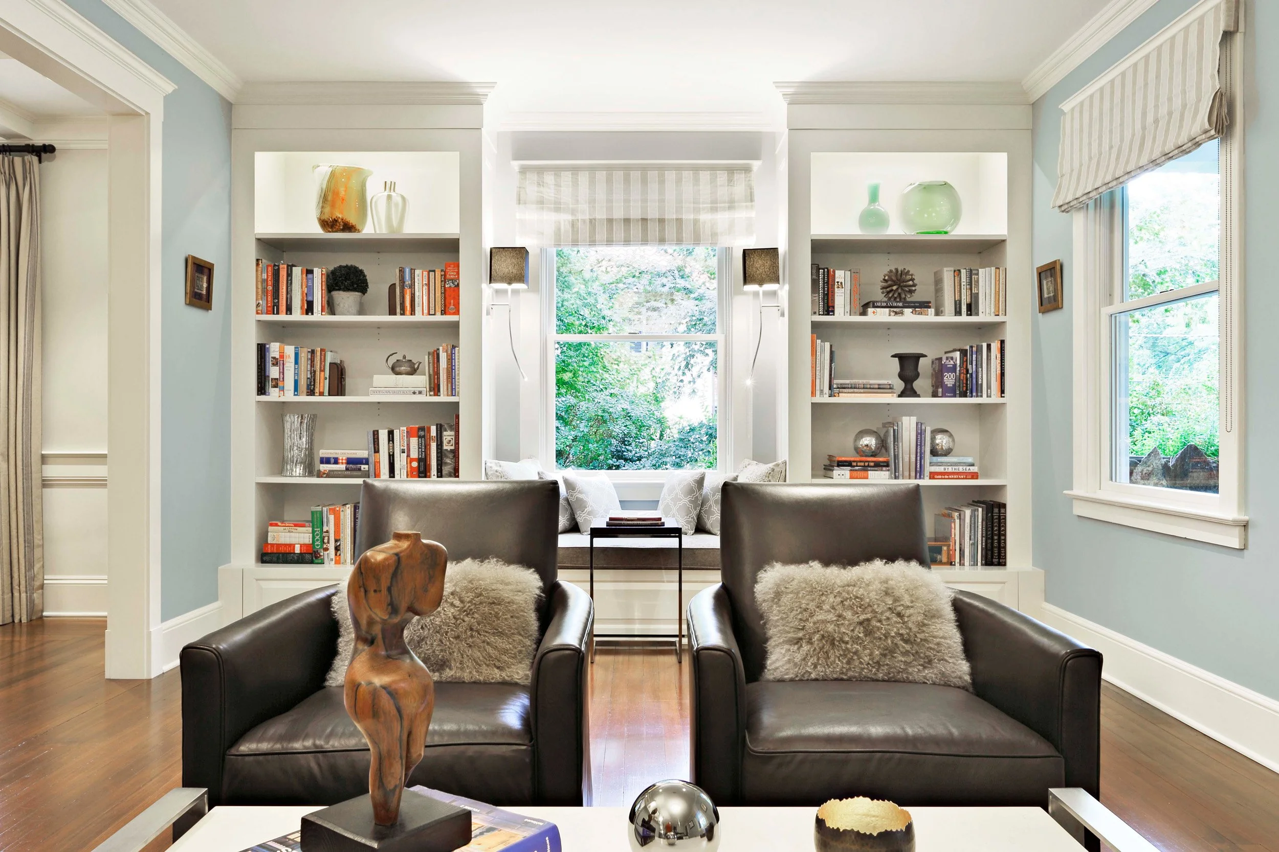 Wide view of living room with balanced layout and natural light in Indian Field residence in Greenwich, CT.