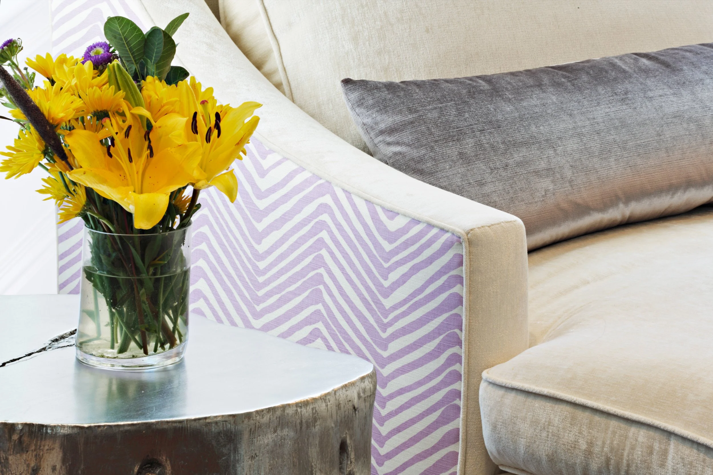 Chaise lounge and side table detail in Parkfield House in Scarsdale NY family room.