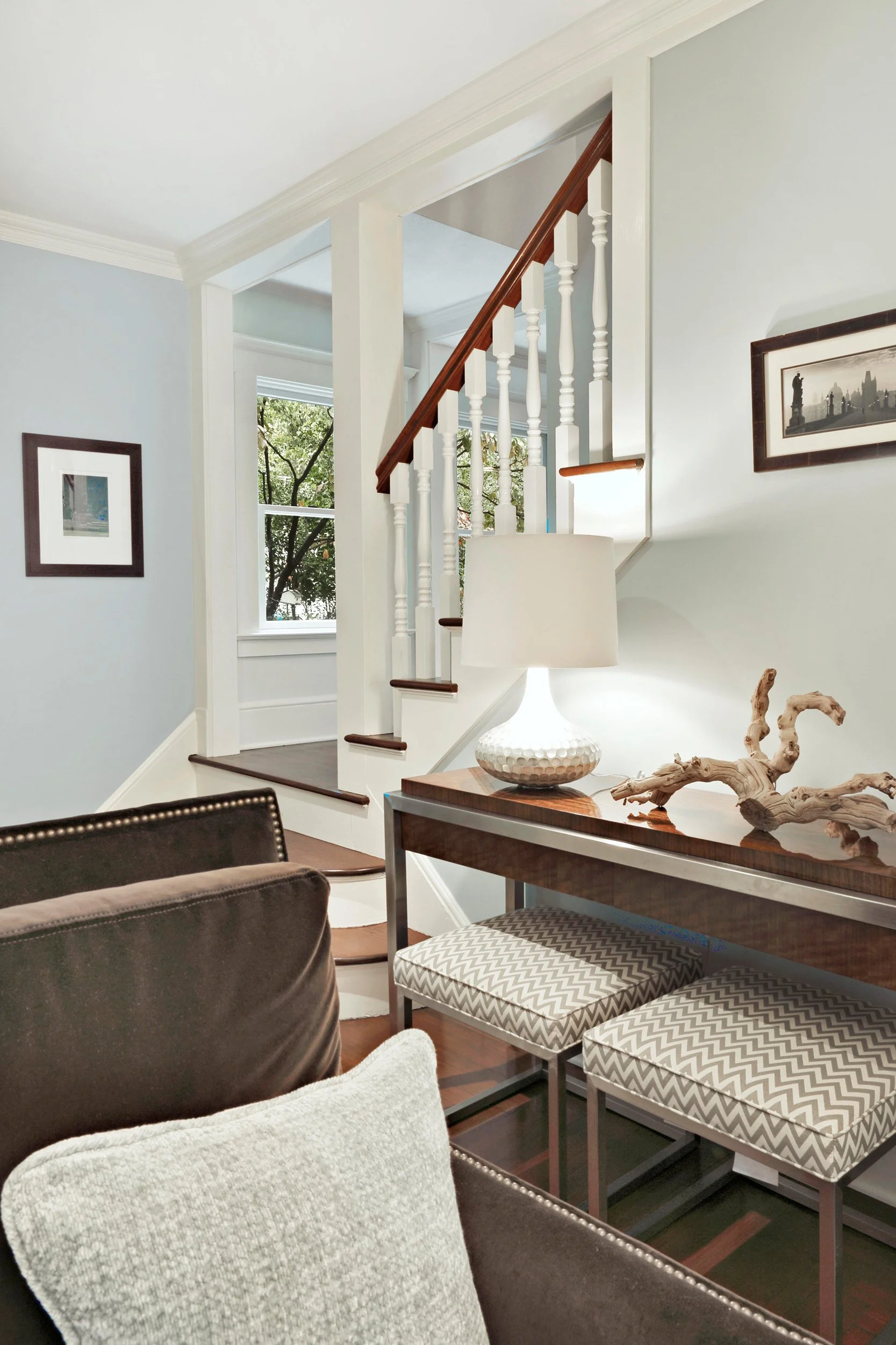 Console table detail styled against living room wall in Indian Field residence in Greenwich, CT.