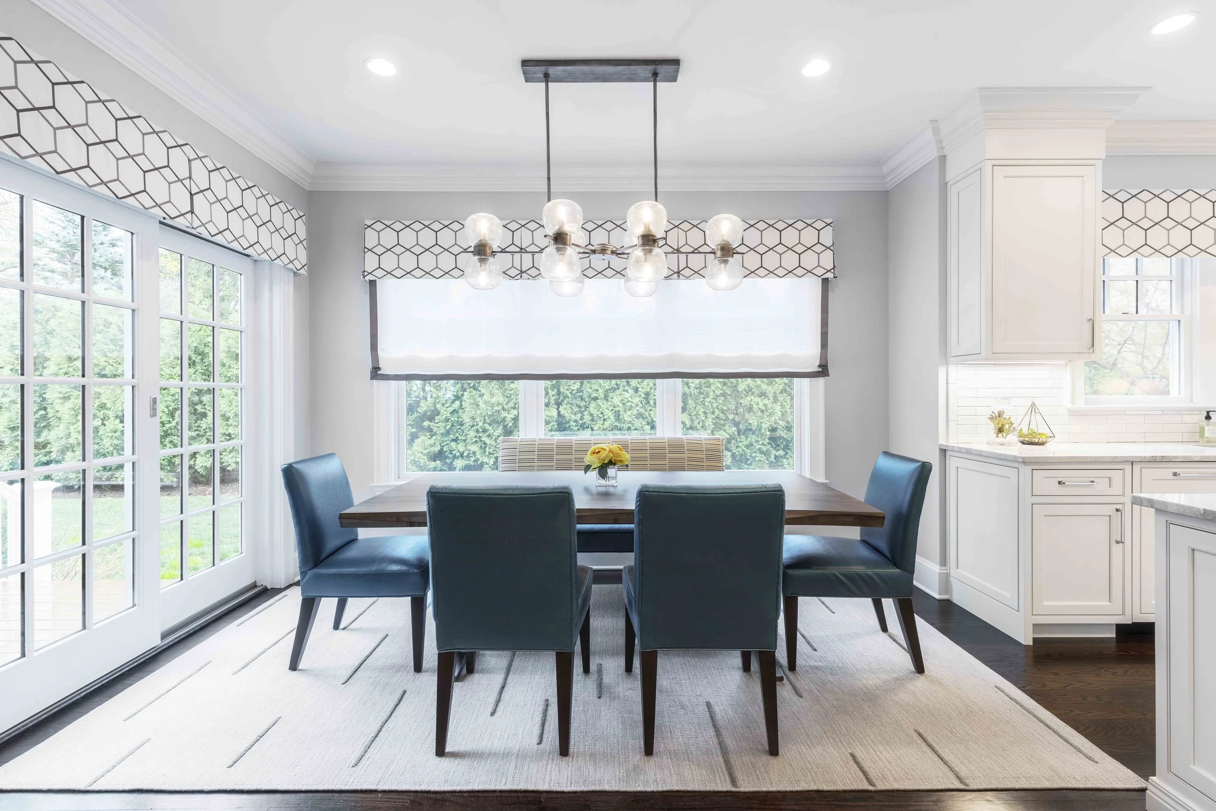 Wide view of the Glen Oaks breakfast area in Rye, NY, featuring a bright, inviting layout and thoughtful furnishings by Luminosus Designs.