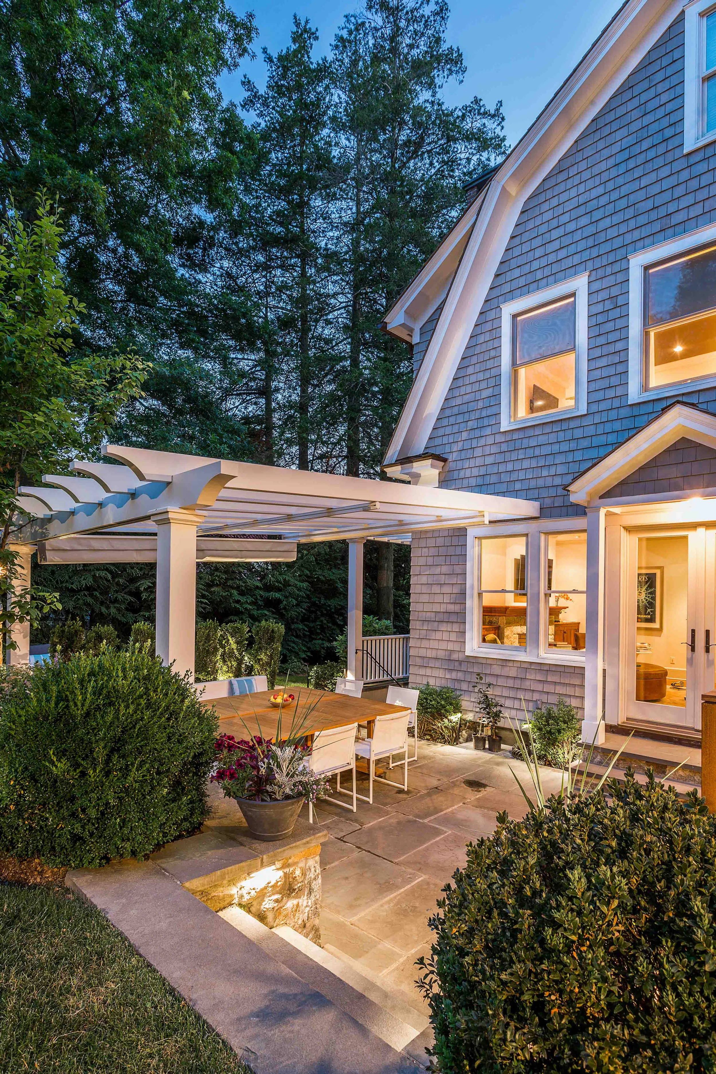 View of stone steps and floor in the outdoor patio at the Indian Field Outdoor project in Greenwich, CT.