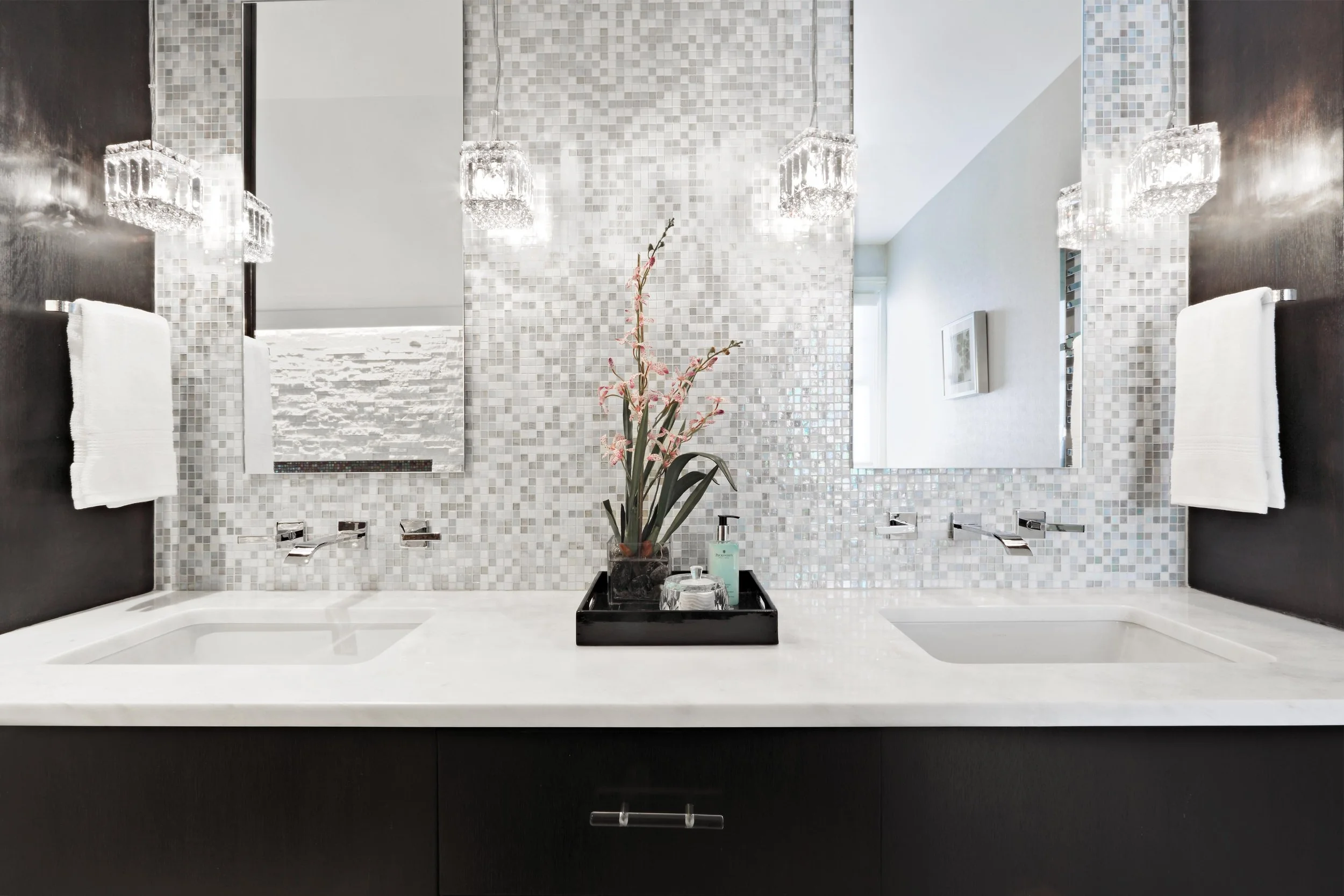 close-up view of the custom vanity and backsplash tile in a primary bathroom in Old Briarcliff, NY.