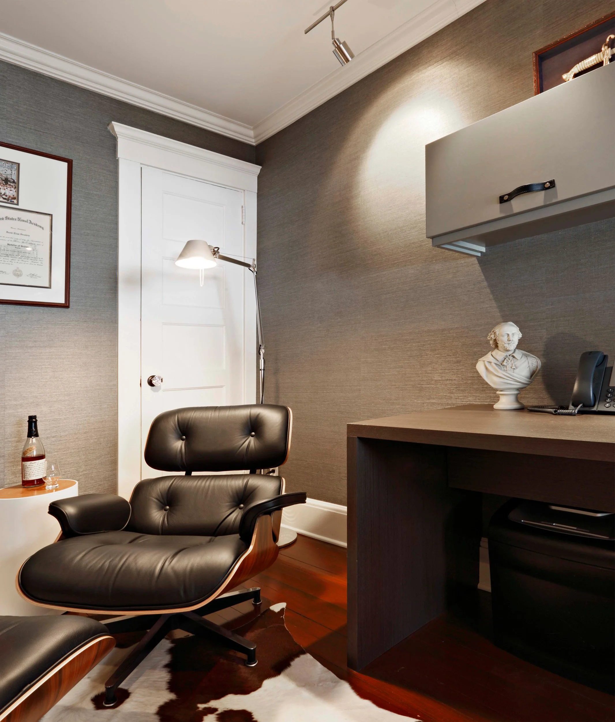 Detail of reading chair positioned for focused work in home office in Indian Field residence in Greenwich, CT.