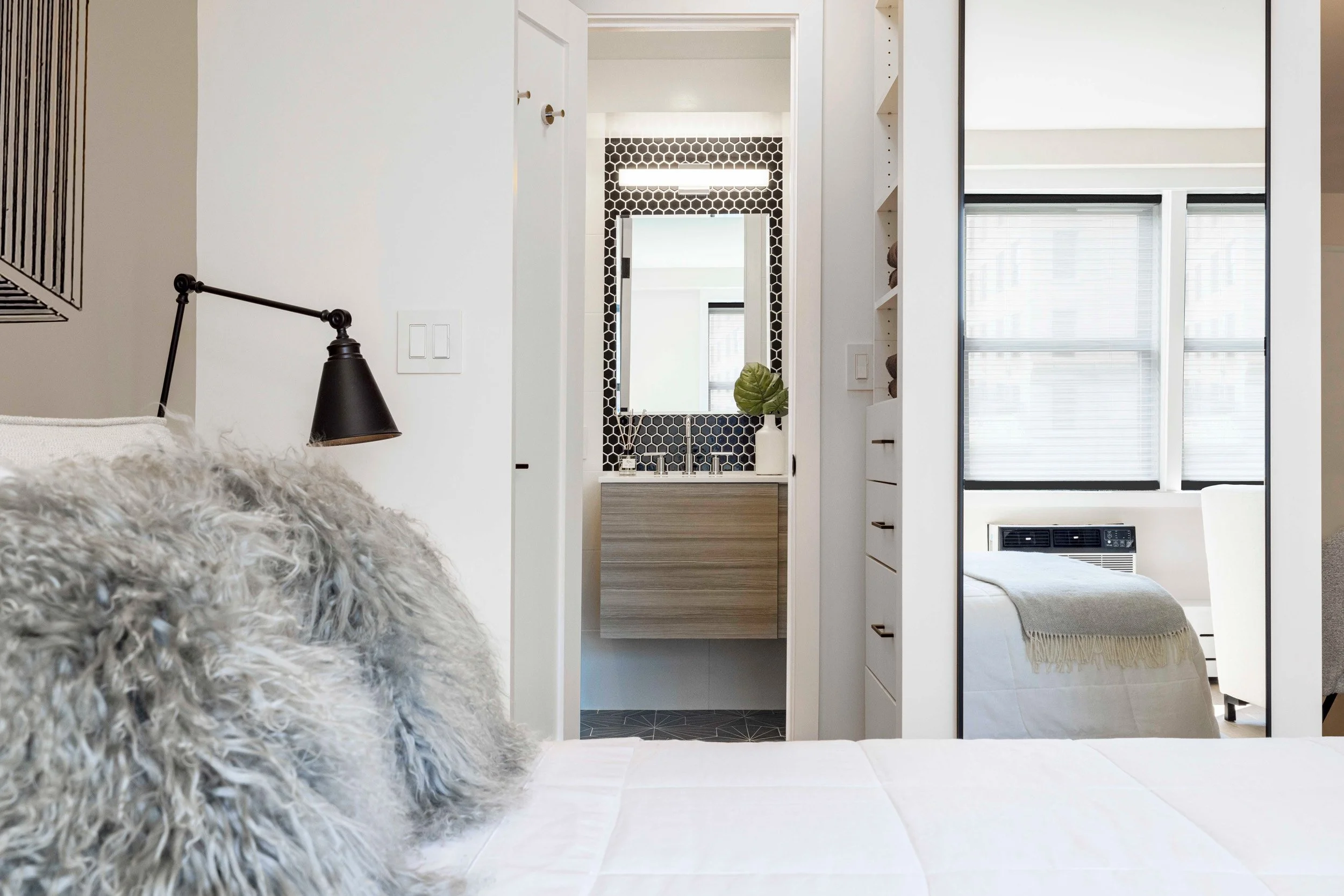 Close-up of sleeping alcove with a view towards bathroom in the Gramercy Arms NYC.