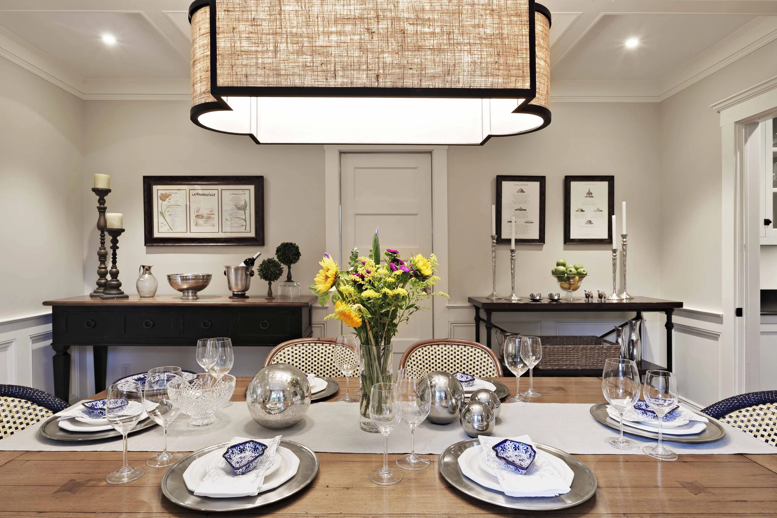 Elegant dining room in Greenwich, CT designed by Luminosus Designs with tailored furnishings and layered lighting.