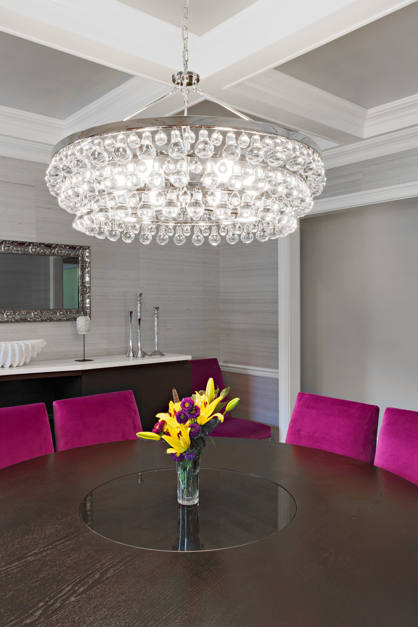 Chandelier and custom dining table in formal dining room in Parkfield House in Scarsdale NY dining room.