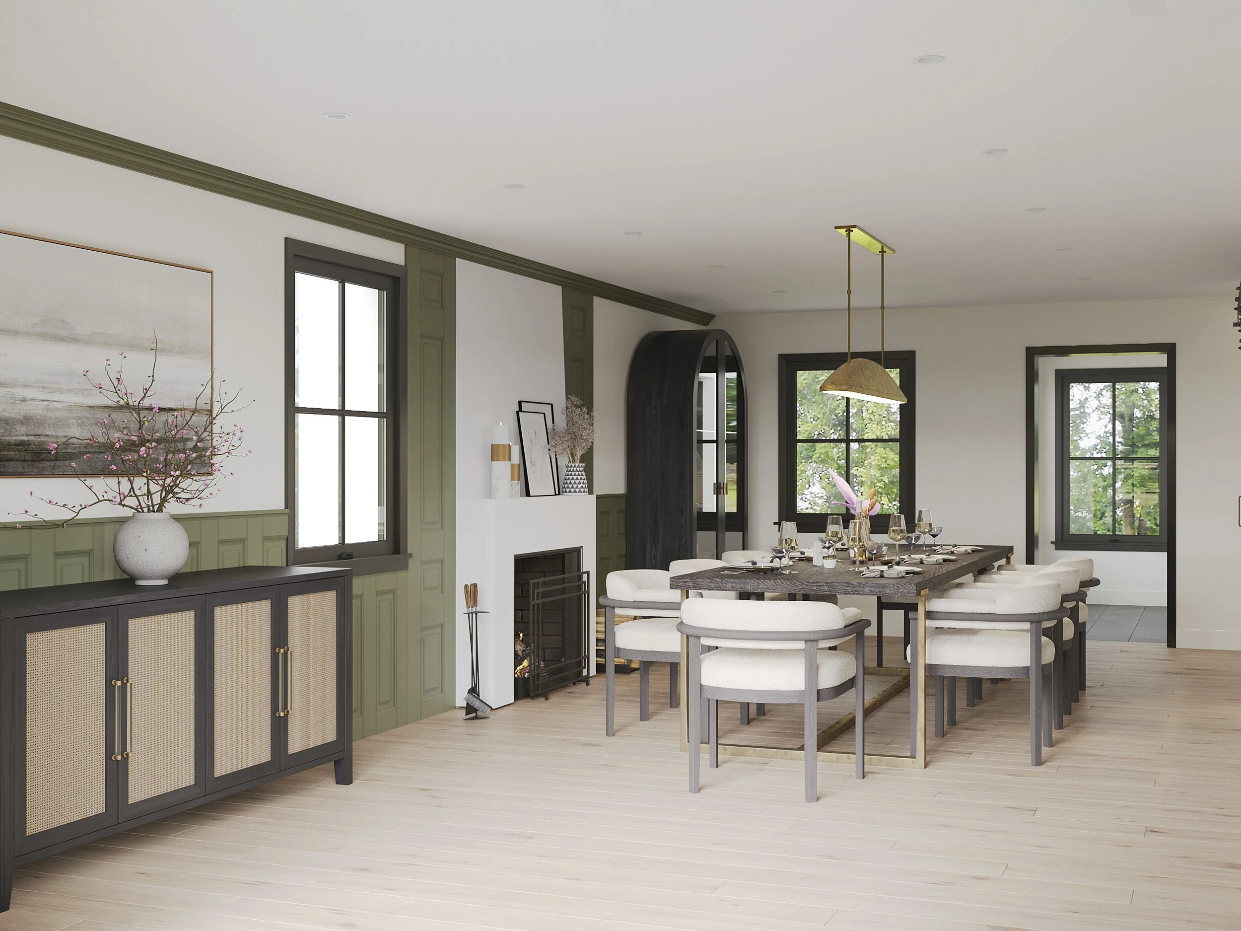  Wide view of dining room featuring brass accented dining table and chandelier in Nanny Hagen House in Thornwood, NY.