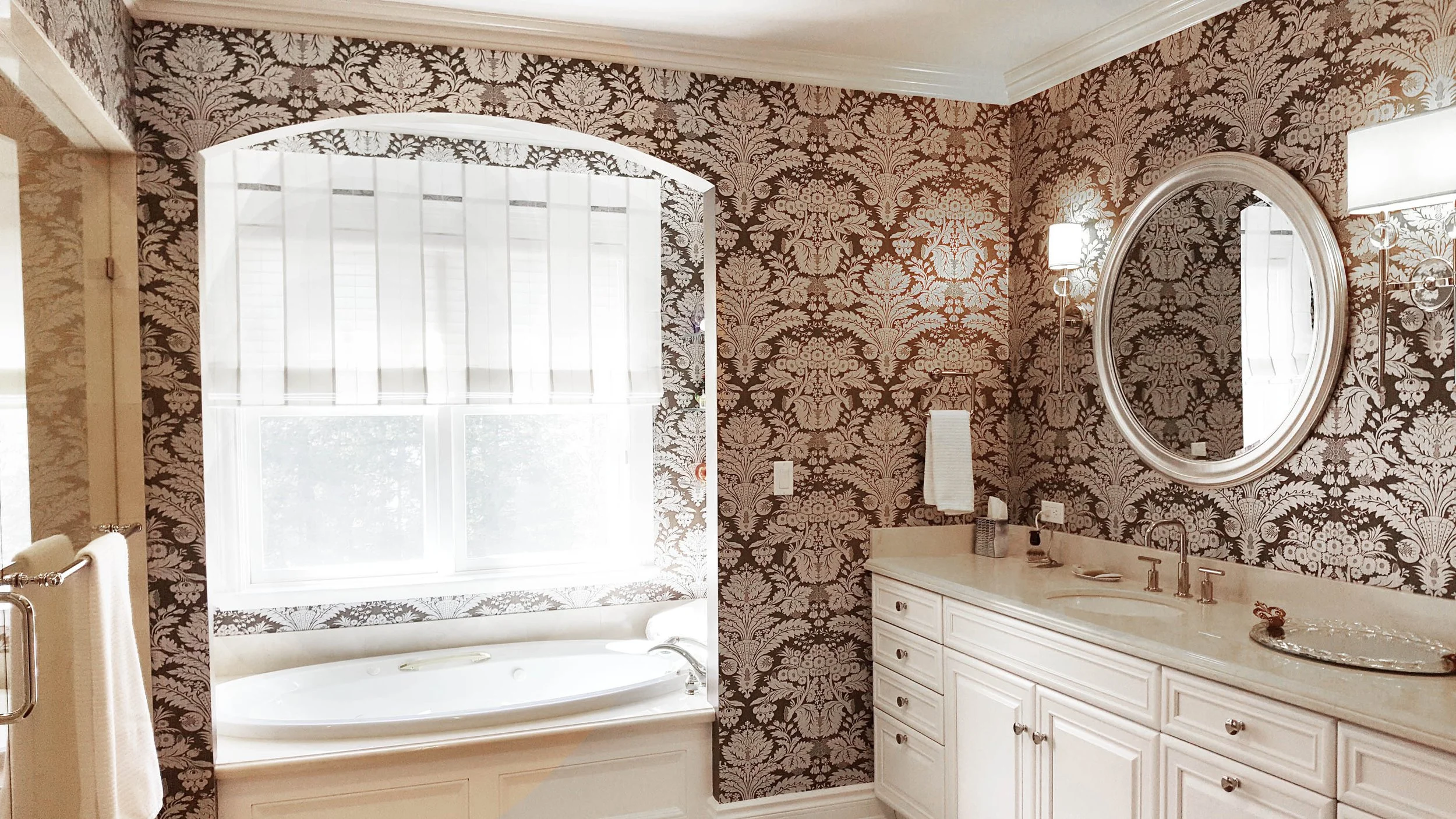 Primary Bathroom featuring soaking tub and vanity at Lismore House in Greenwich, Connecticut by Luminosus Designs.