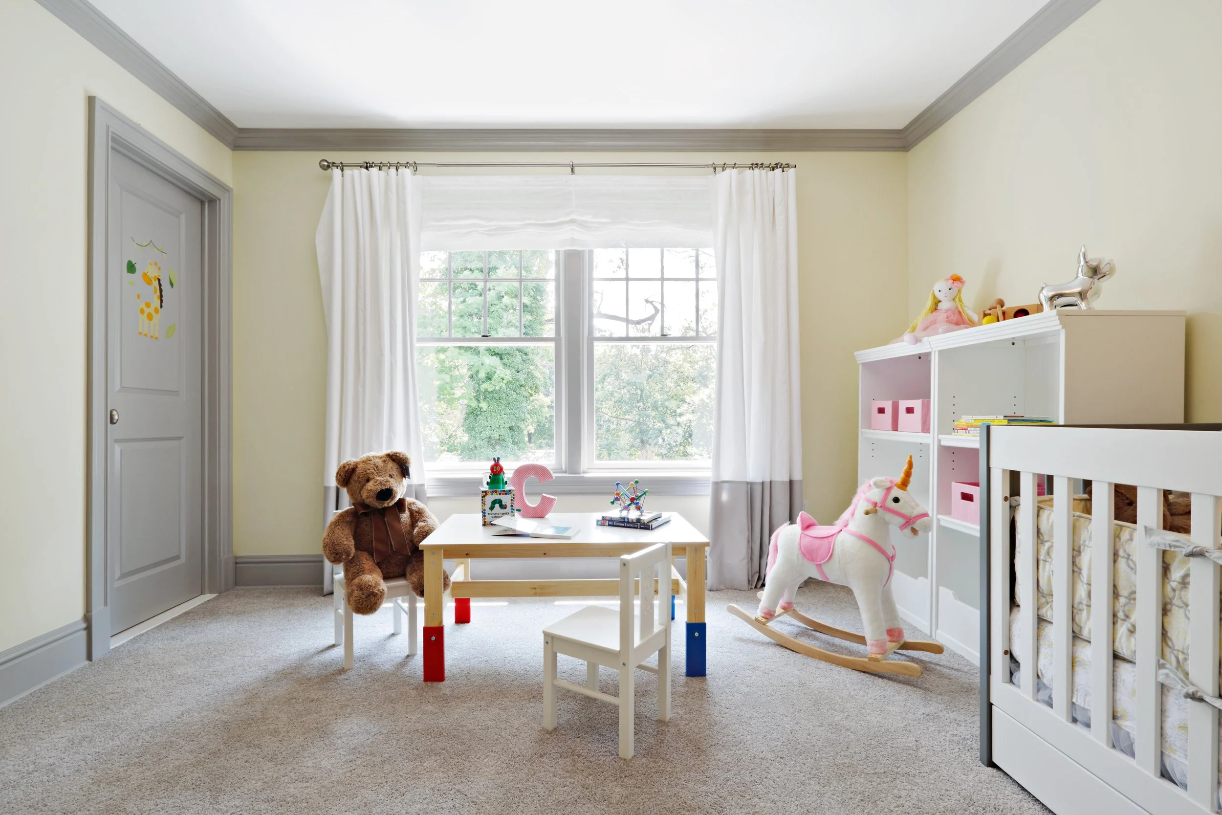 Girl’s bedroom in Parkfield House in Scarsdale NY home with soft color palette by Luminosus Designs.