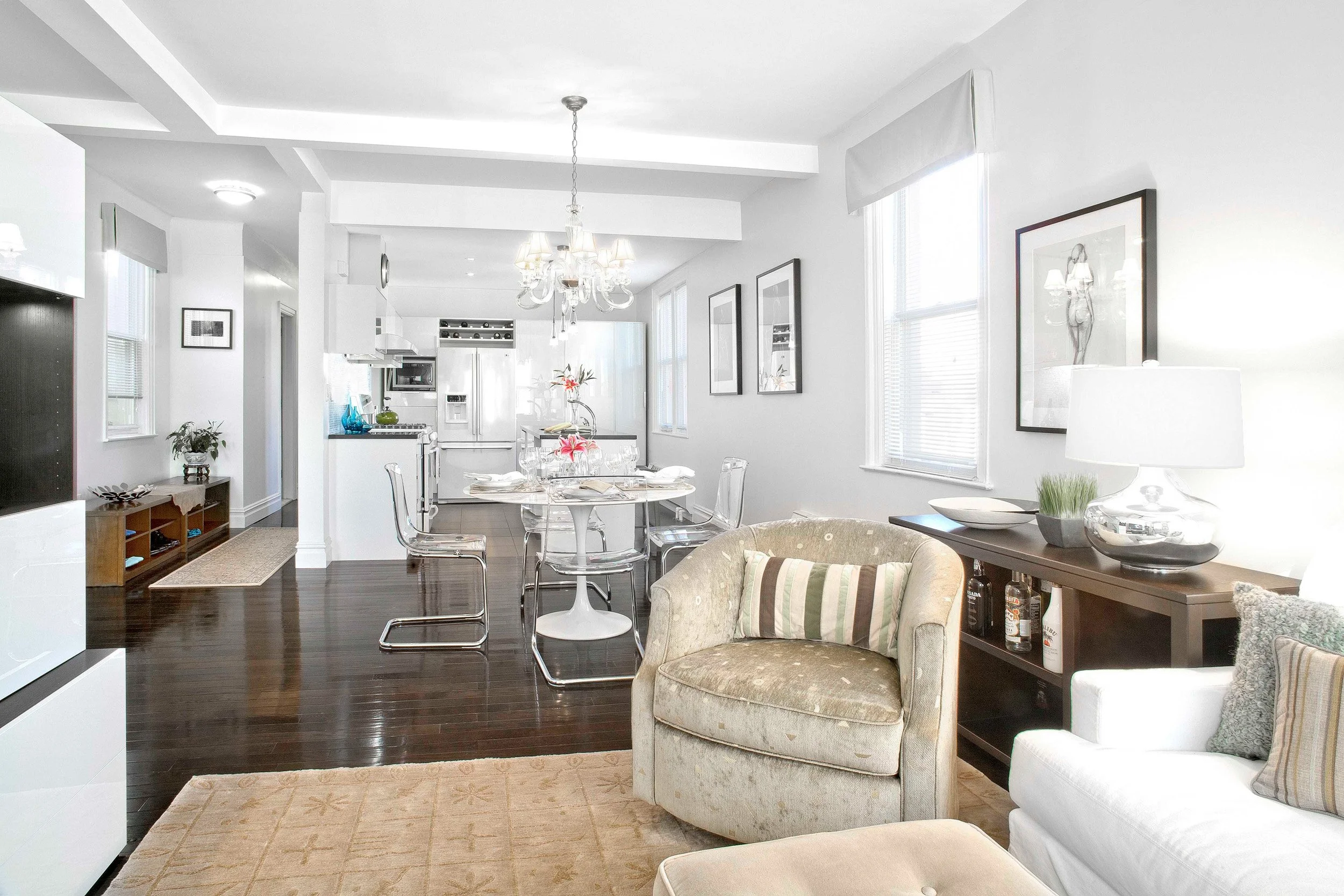 Wide view of open-concept main living area at the Muliner House in Bronx, NY designed by Luminosus Designs.