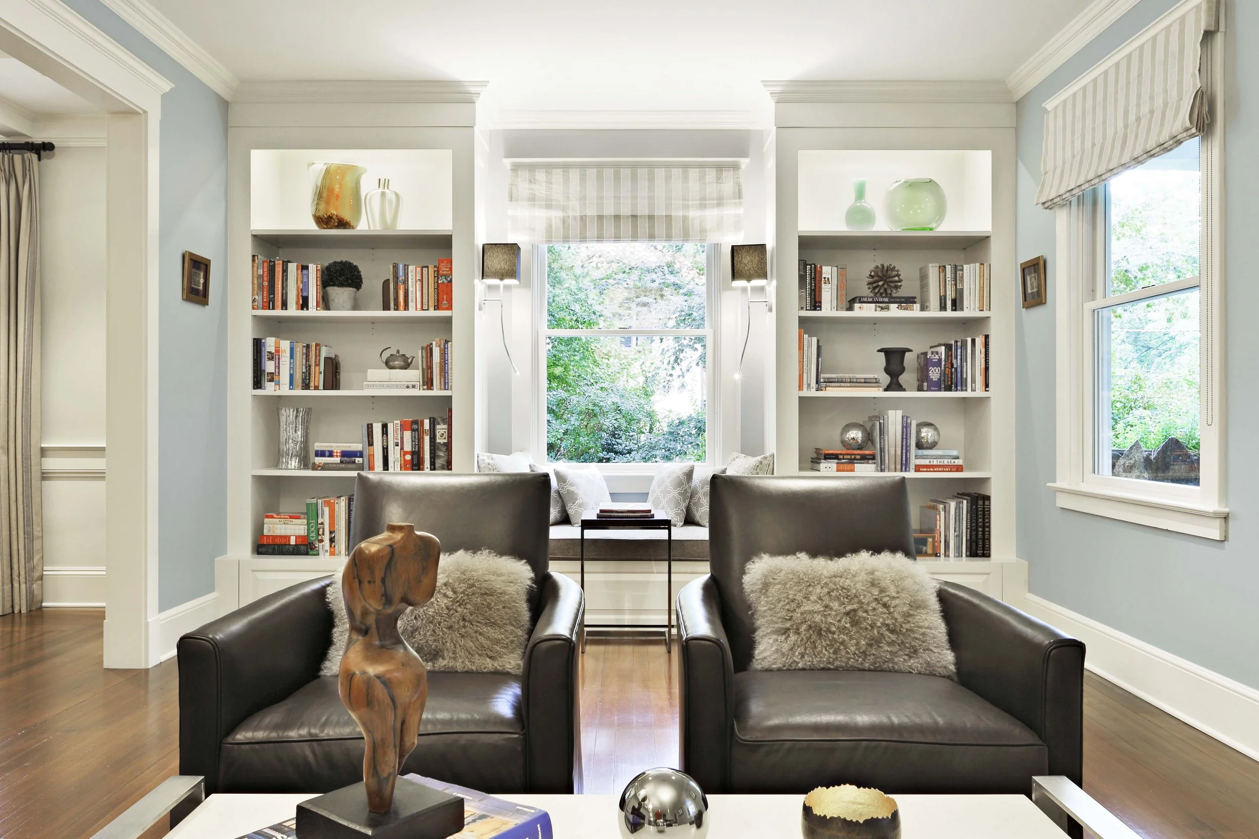 Wide view of living room with balanced layout and natural light.